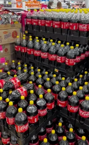 Coca-Cola bottles with yellow caps - kosherguru via Instagram