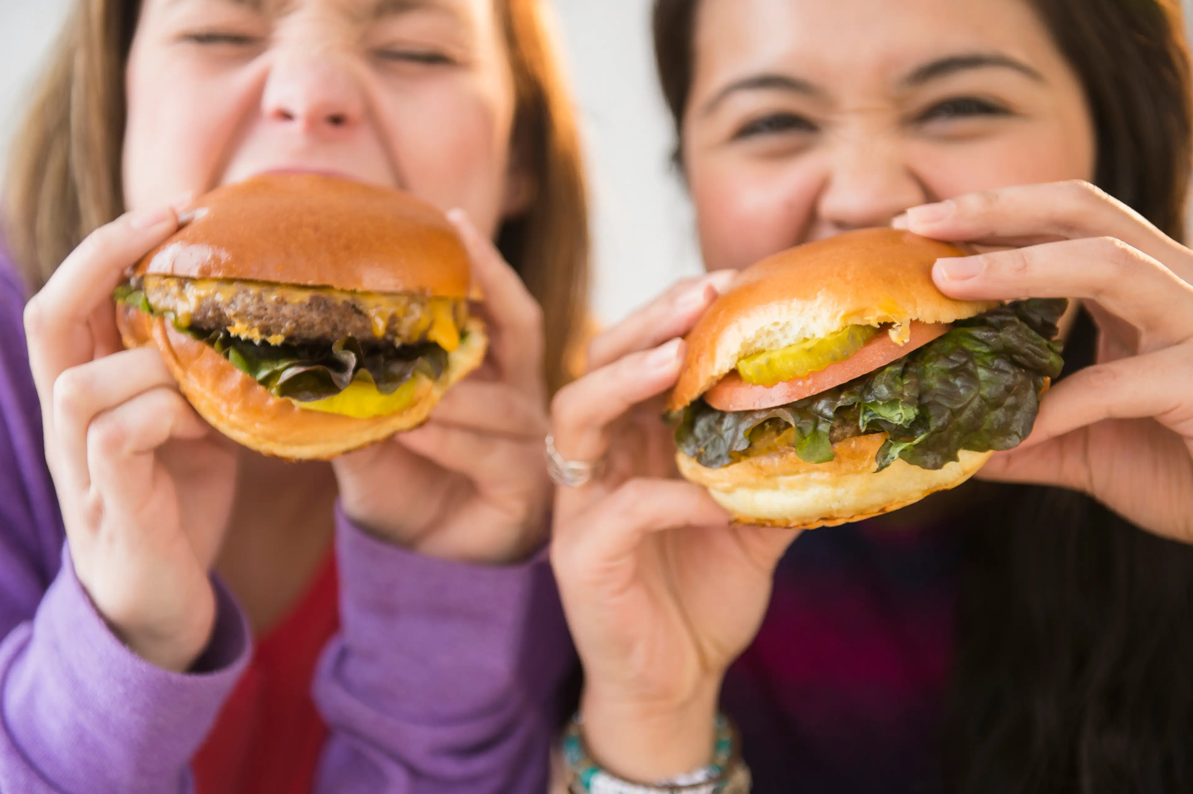 Eating fast-food items like burgers with your loved ones may not be a good idea (Getty Stock Image)
