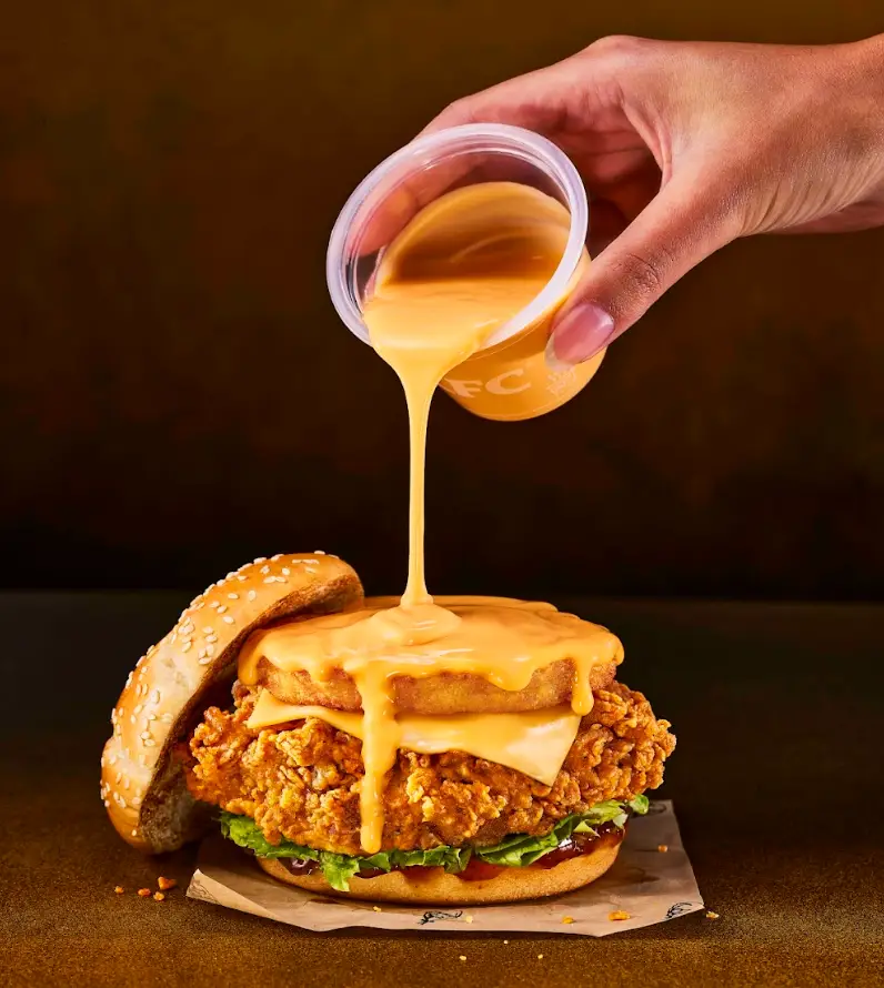 The new Cheesy Melt Burger is available for six weeks (KFC)