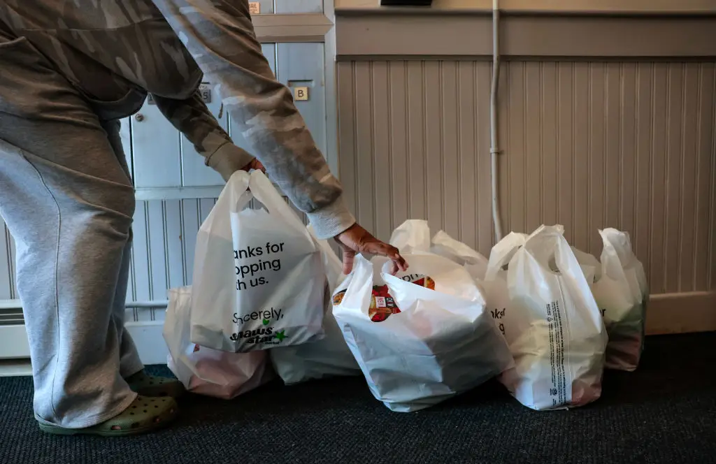 Plenty of people use apps like Doordash for takeaway deliveries and groceries (Craig F. Walker/The Boston Globe via Getty Images)