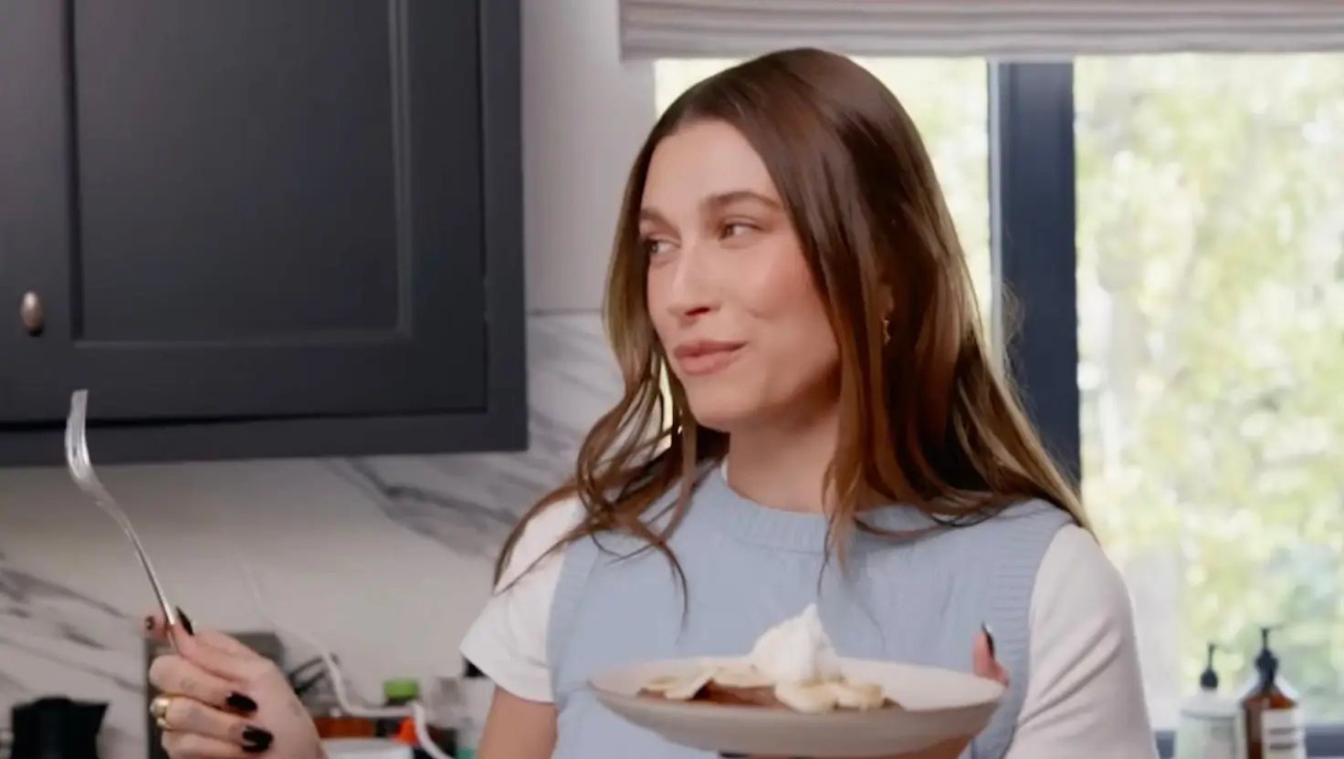 The model sometimes eats chocolate-flavoured pancakes for breakfast (YouTube)