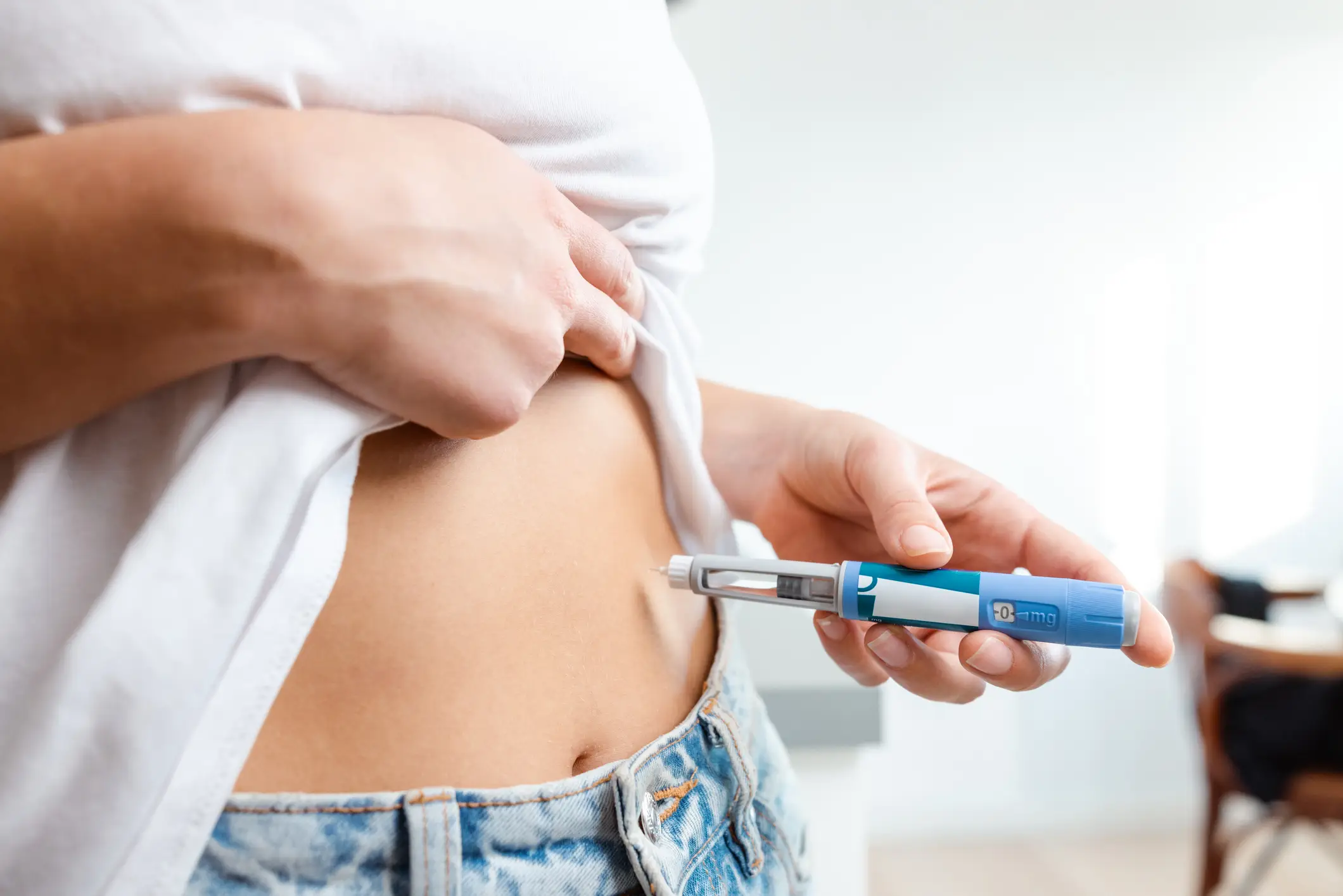 People with type 2 diabetes often need to take insulin shots to regulate their blood sugar (blackCAT/Getty Images)
