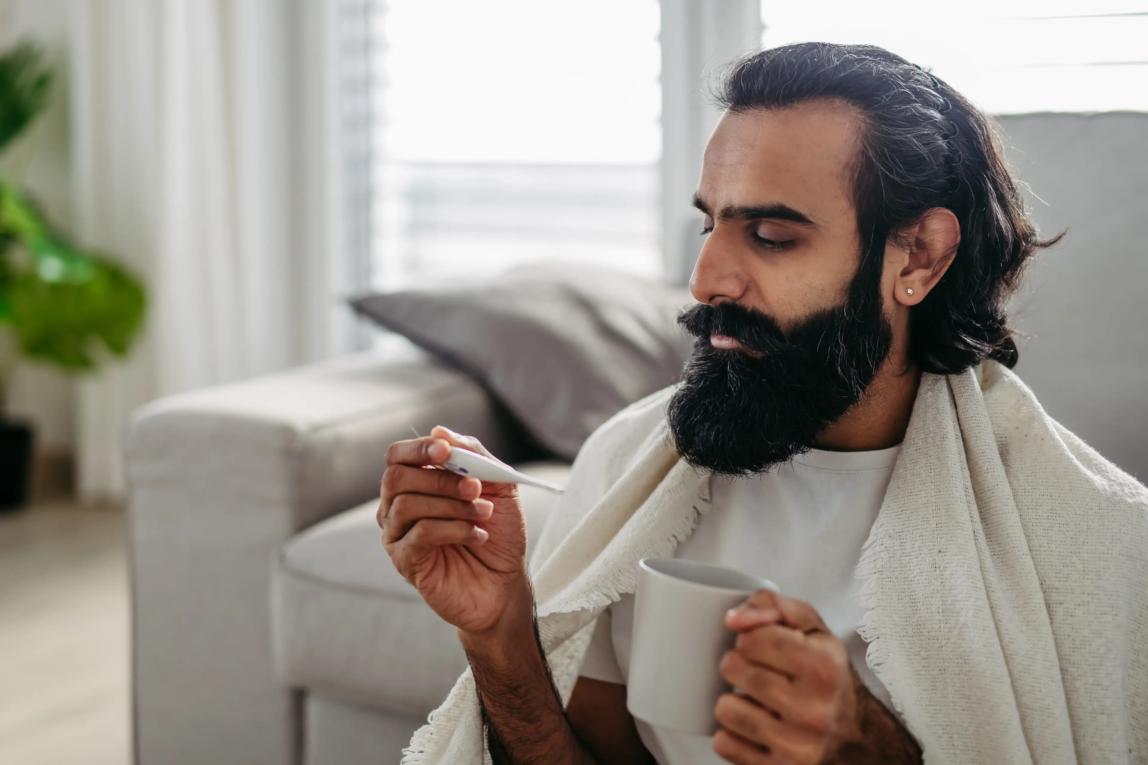 Cyclosporiasis can cause symtoms such as high fever and watery stool (Getty Stock Image)