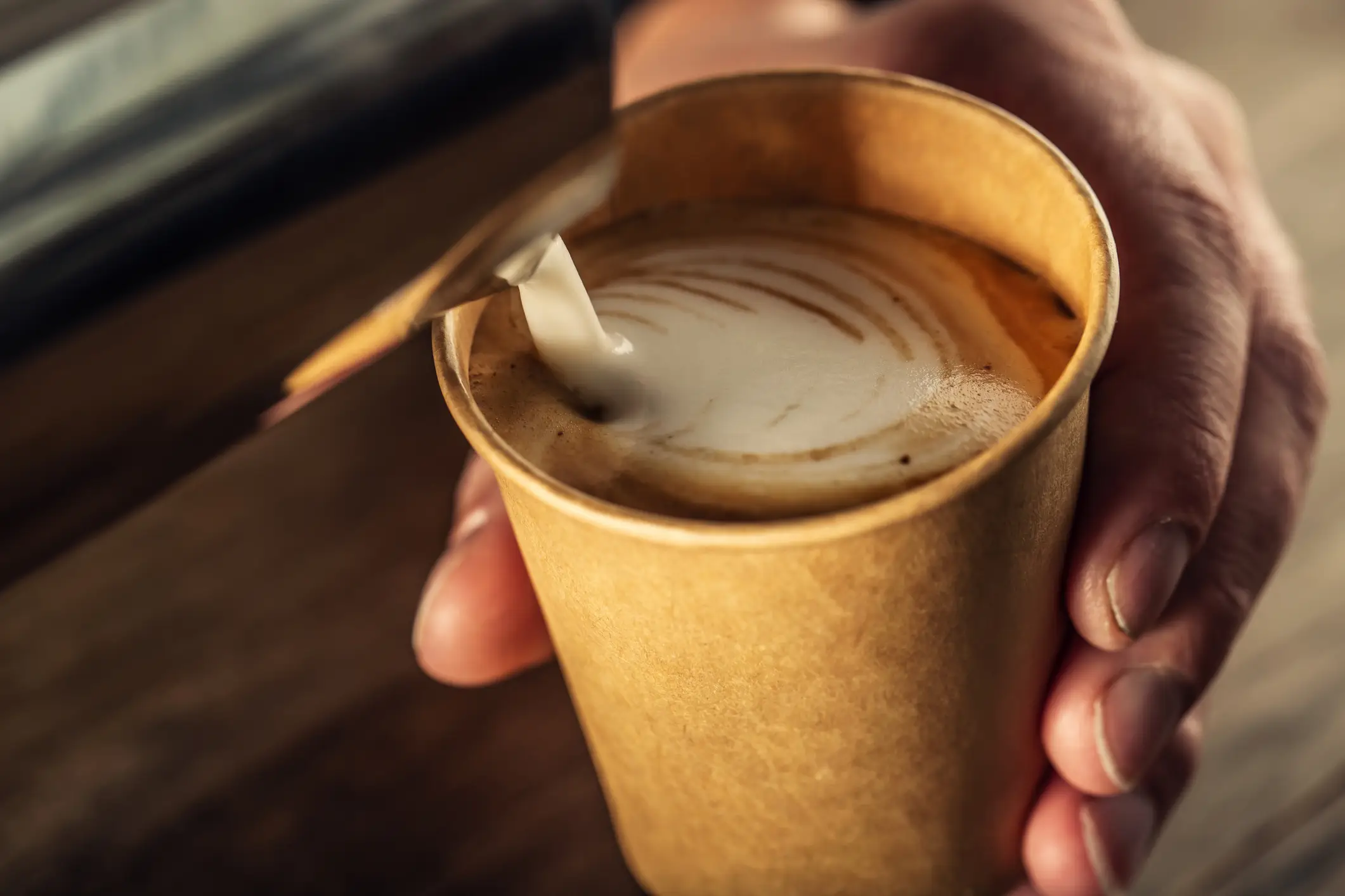 Apparently a coffee with no lid is best, according to scientists (Getty Stock)