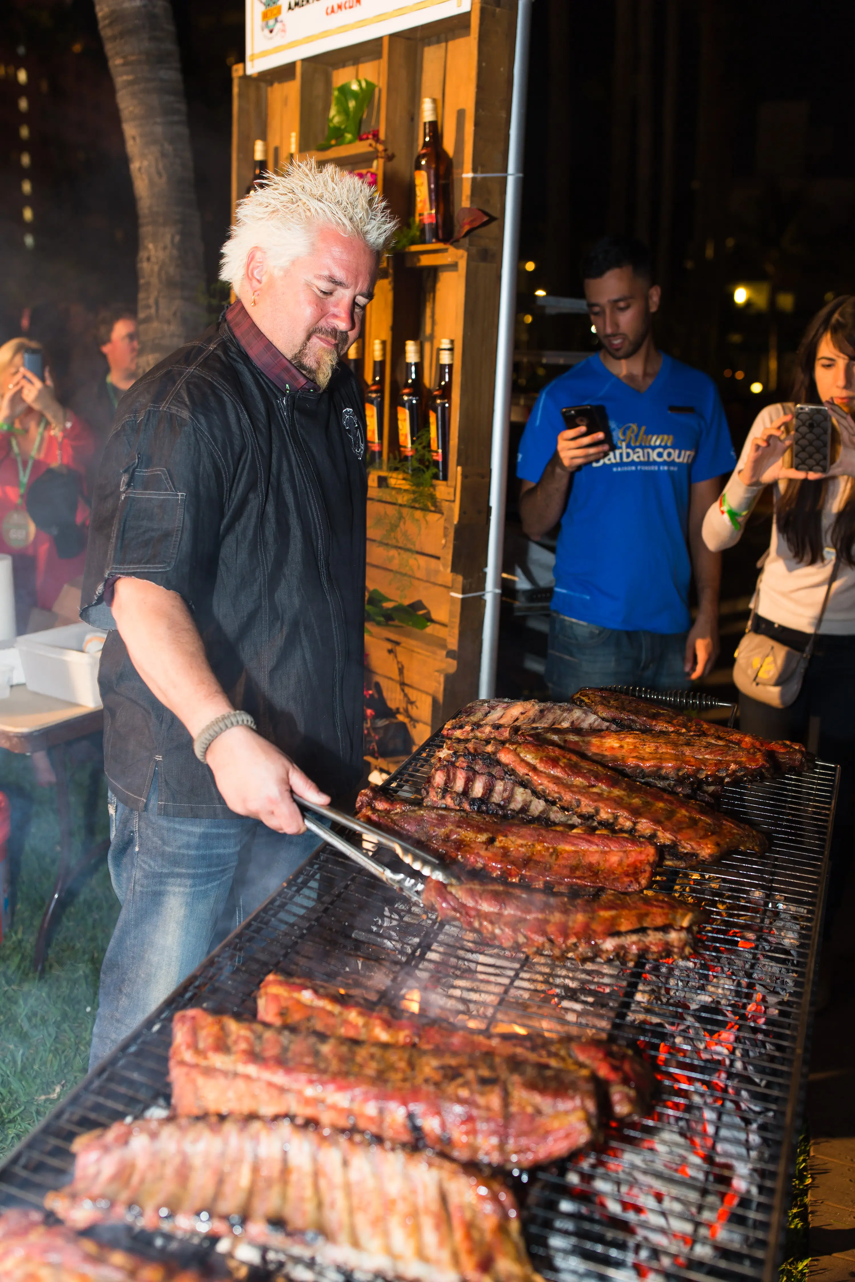Channel your inner Guy Ferreri by making sure your charcoals are glowing red before you start grilling (Dylan Rives/Getty Images for SOBEWFF®)