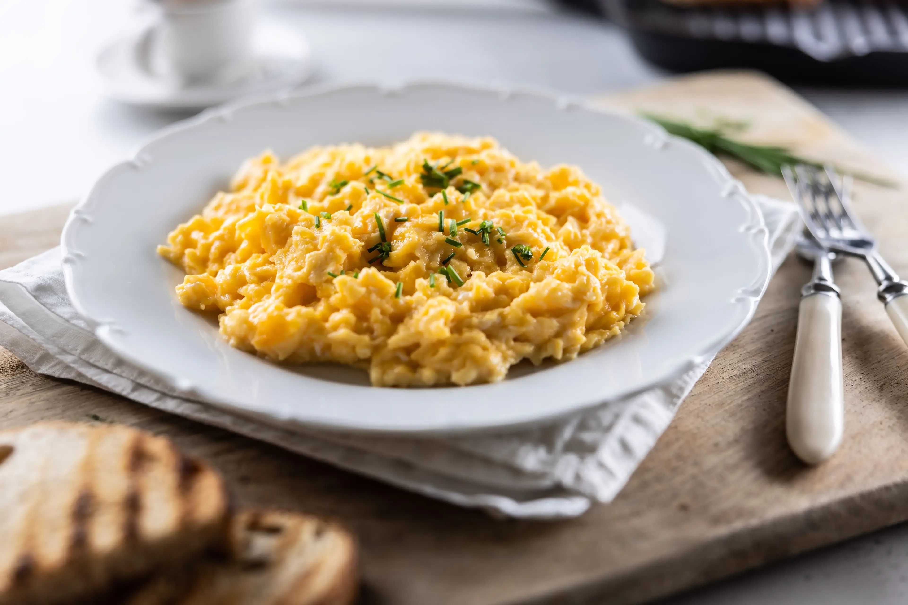 Cooking scrambled eggs Hong Kong-styles results in a rich flavour and creamy texture (Getty Stock Image/MarianVejcik)