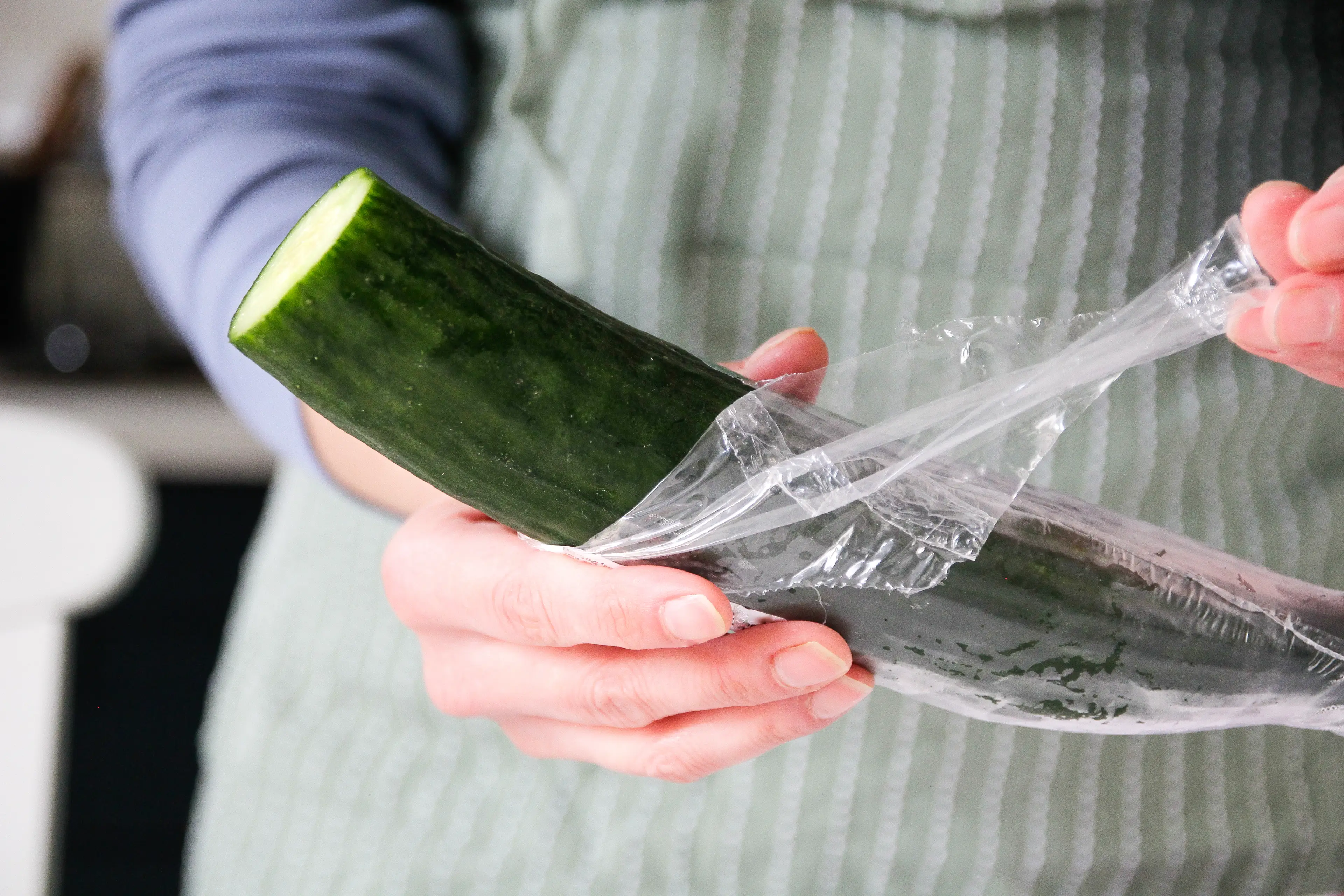 Peeling the plastic off a cucumber doesn't feel as good as taking plastic off a new DVD or video game (Kinga Krzeminska/Getty Images)