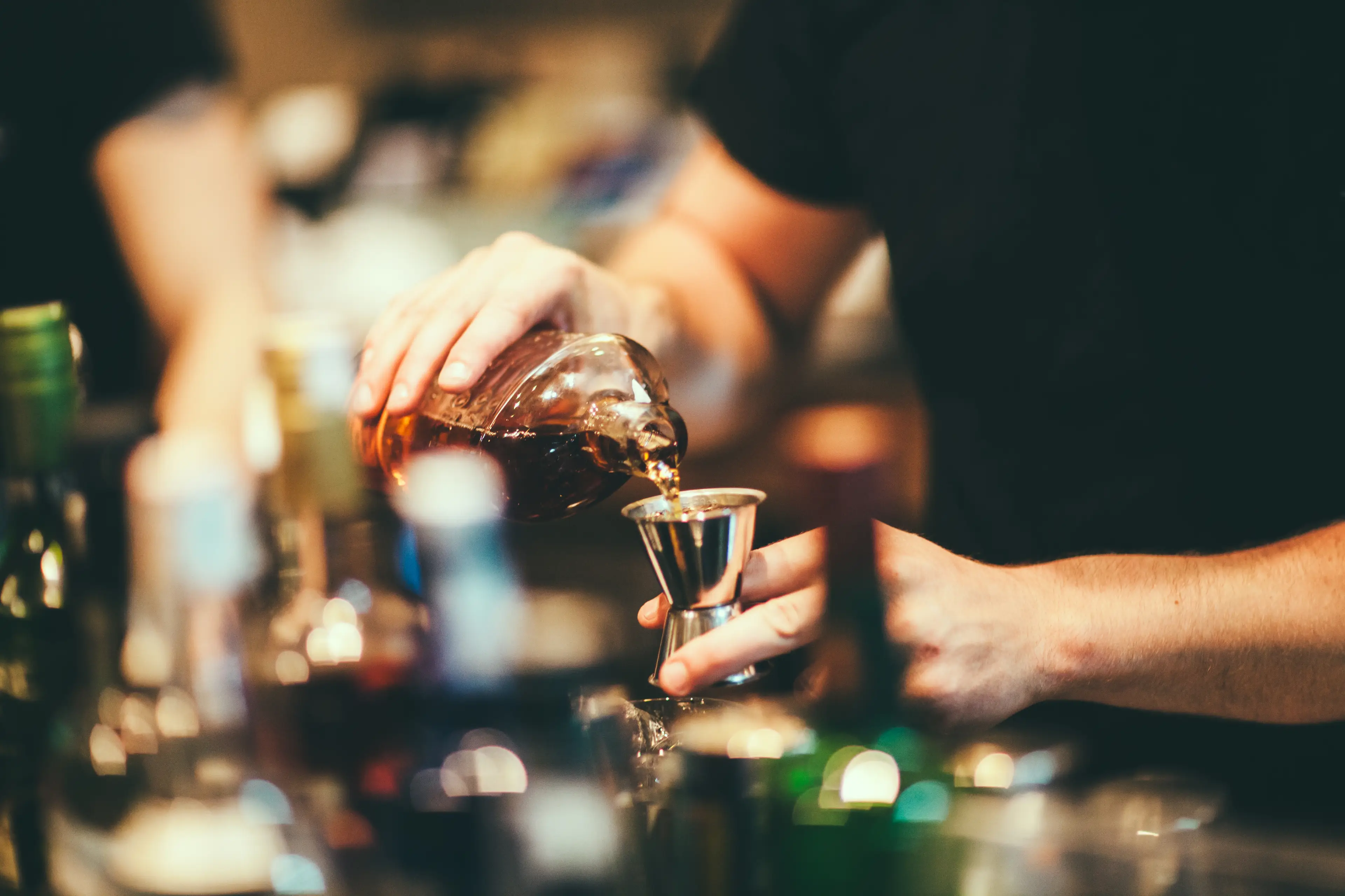 Bartender prepares a cocktail (Rafael Elias via Getty Images)