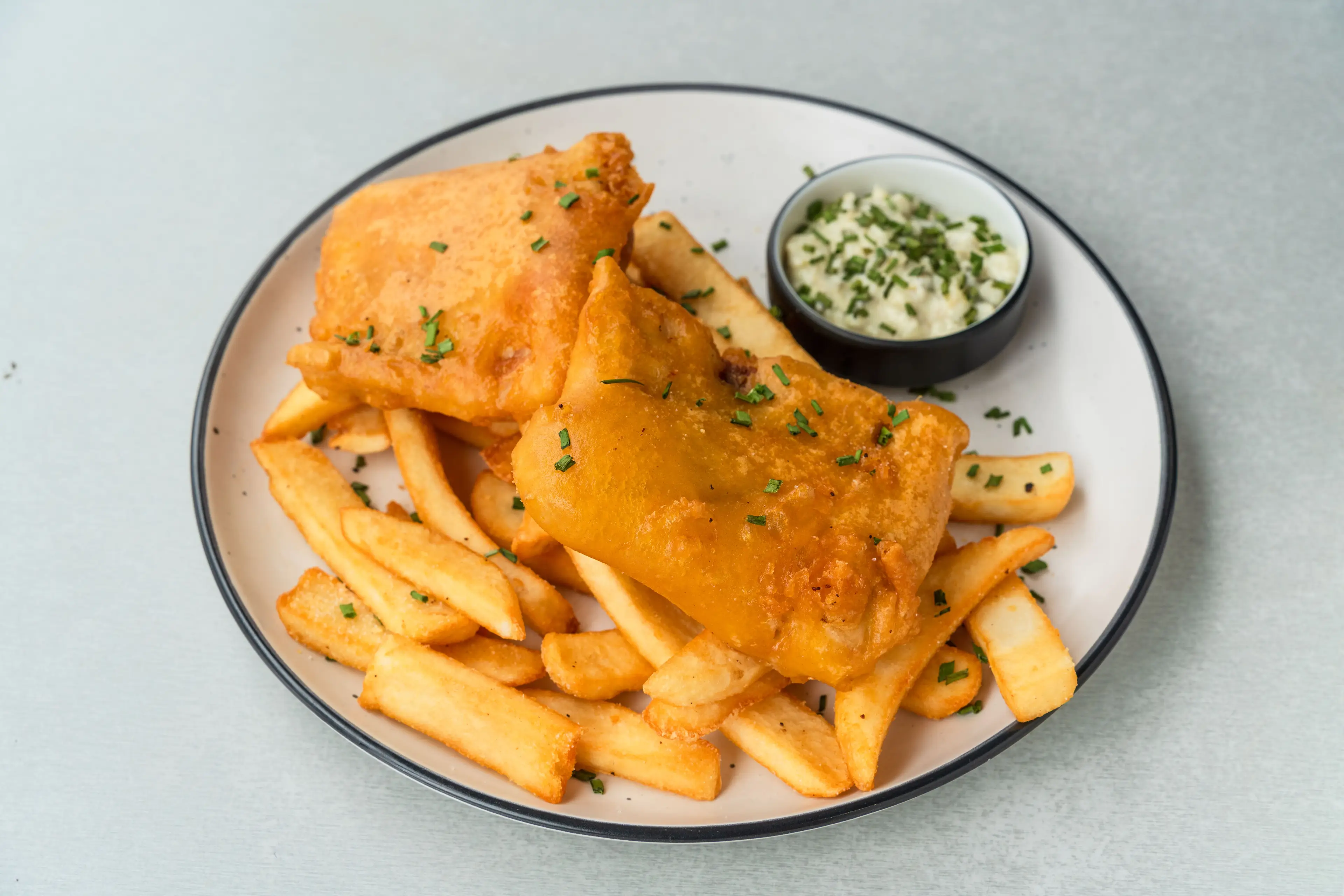 You may think you're purchasing cod or haddock, but some fish and chip shops are selling catfish instead (Getty Stock Image)