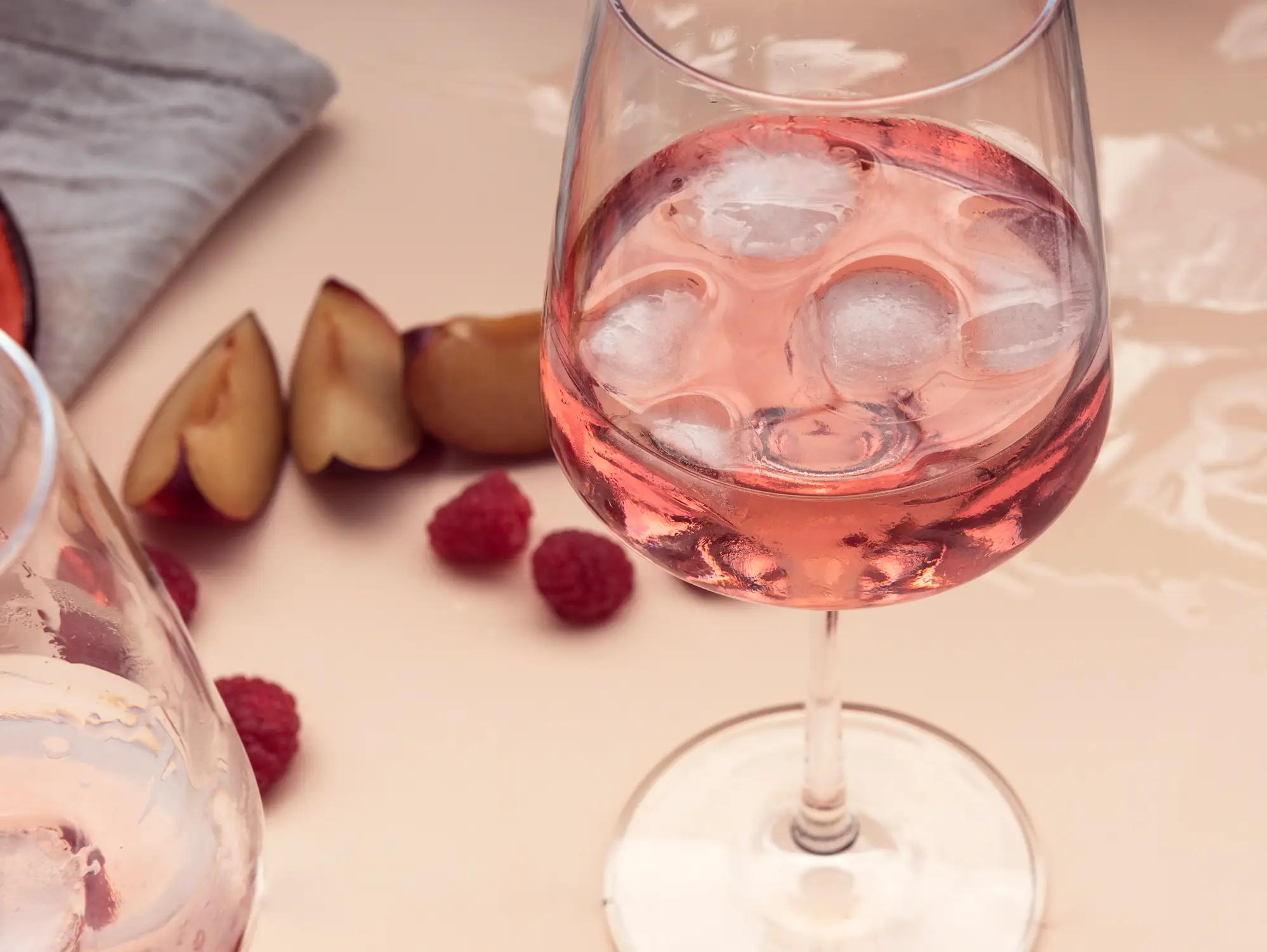 A glass of rosé with some ice - Valentina Mancini via Getty Images