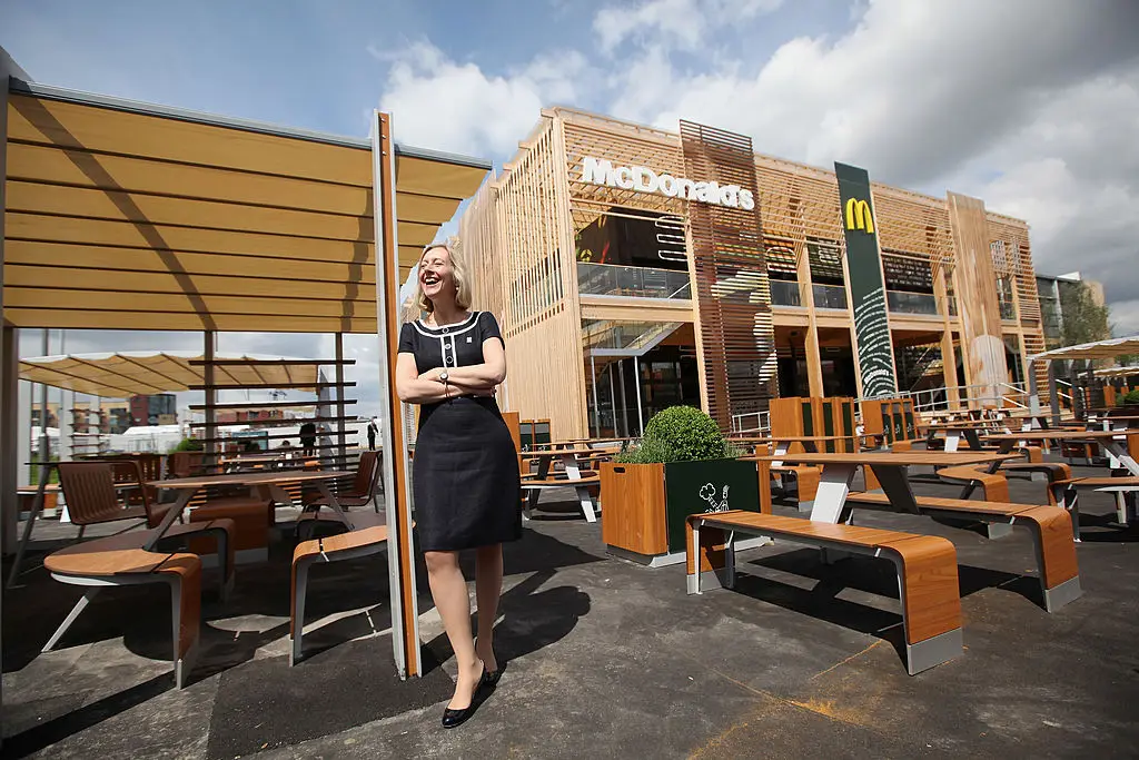 Jill McDonald, the Chief Executive Officer of McDonald's UK, poses for a photograph in front of the world's largest McDonald's restaurant. (Oli Scarff/Getty Images)