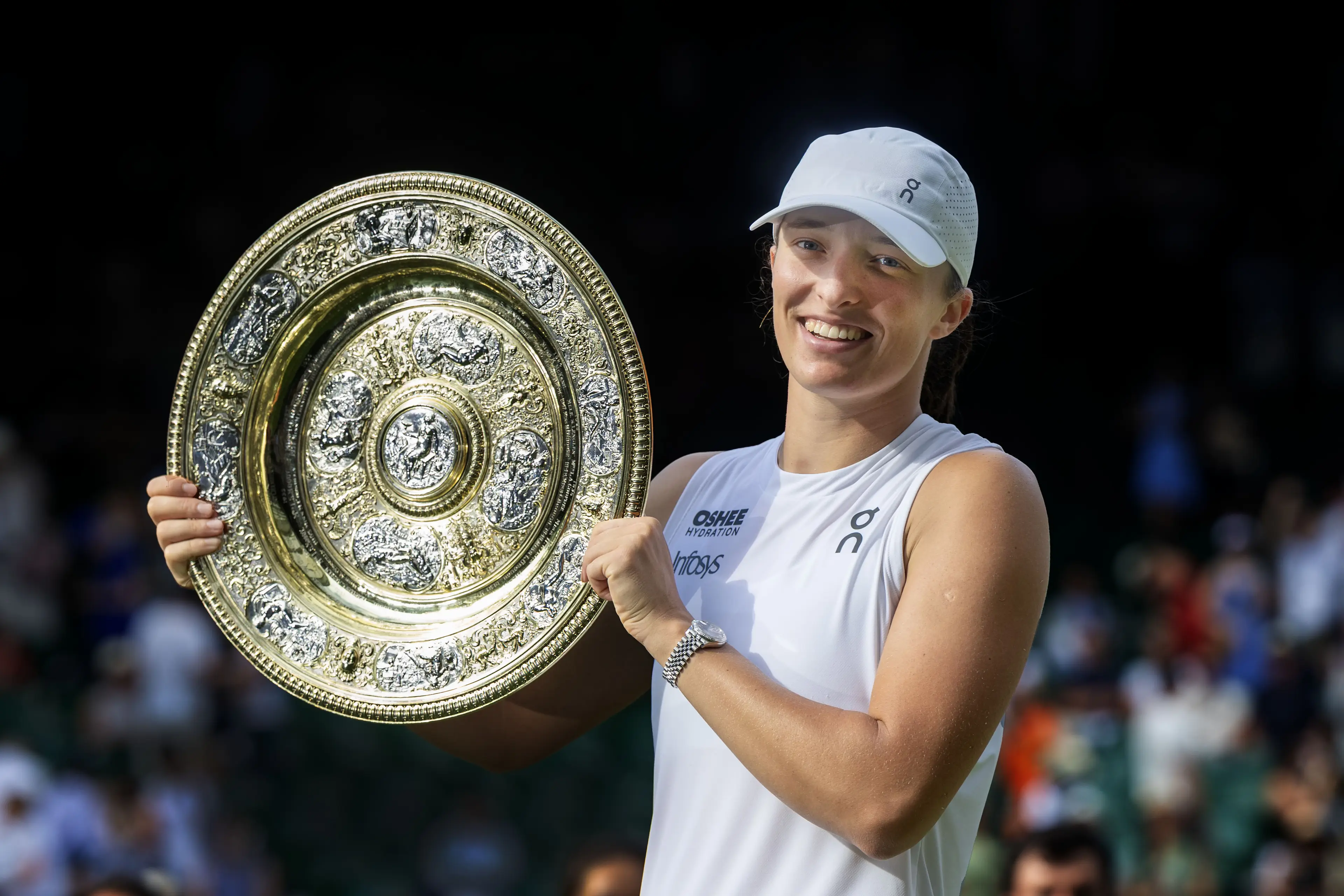 Iga Świątek heads into Wimbledon 2026 as the reigning women's singles champion (Tim Clayton/Getty Images)