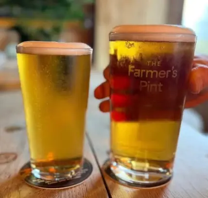A community note has referenced the fact that the cheapest pint at The Farmer's Dog costs £6.75 (Instagram/@thefarmersdogpub)