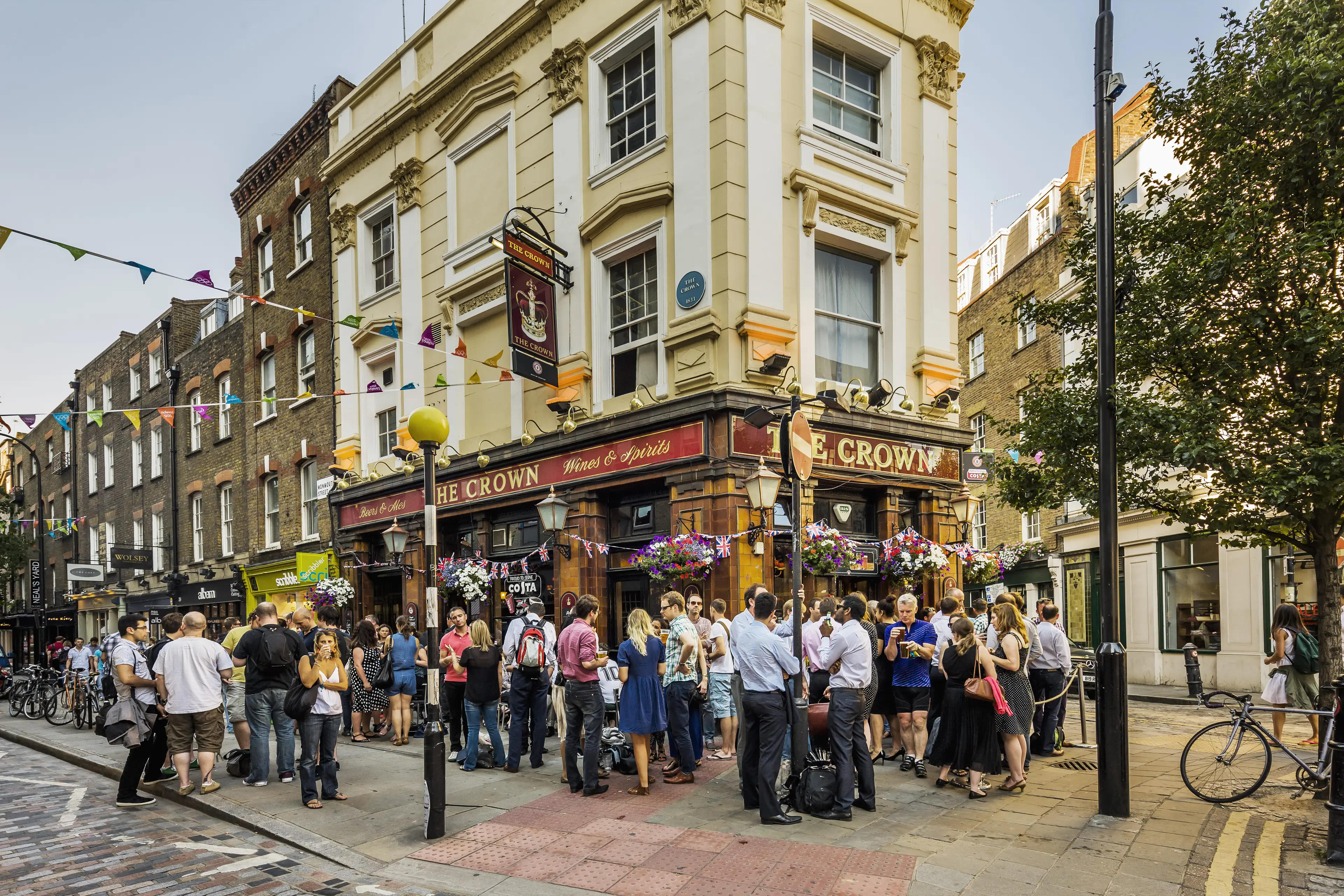 Standing outside with your pint in Soho could become a thing of the past (Getty Stock Image)