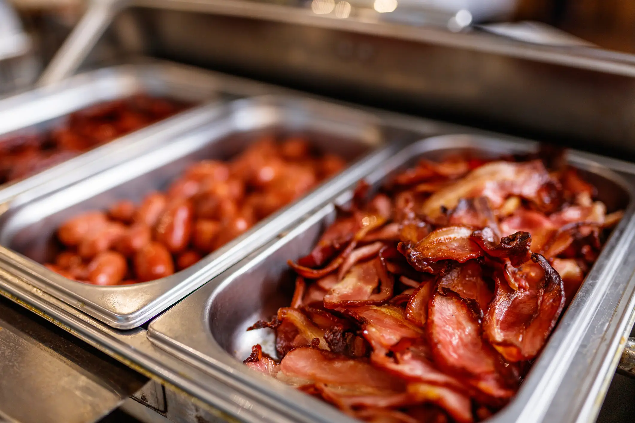 High quantities of bacon, sausage and fatty meats can cause a problem (Getty Stock)