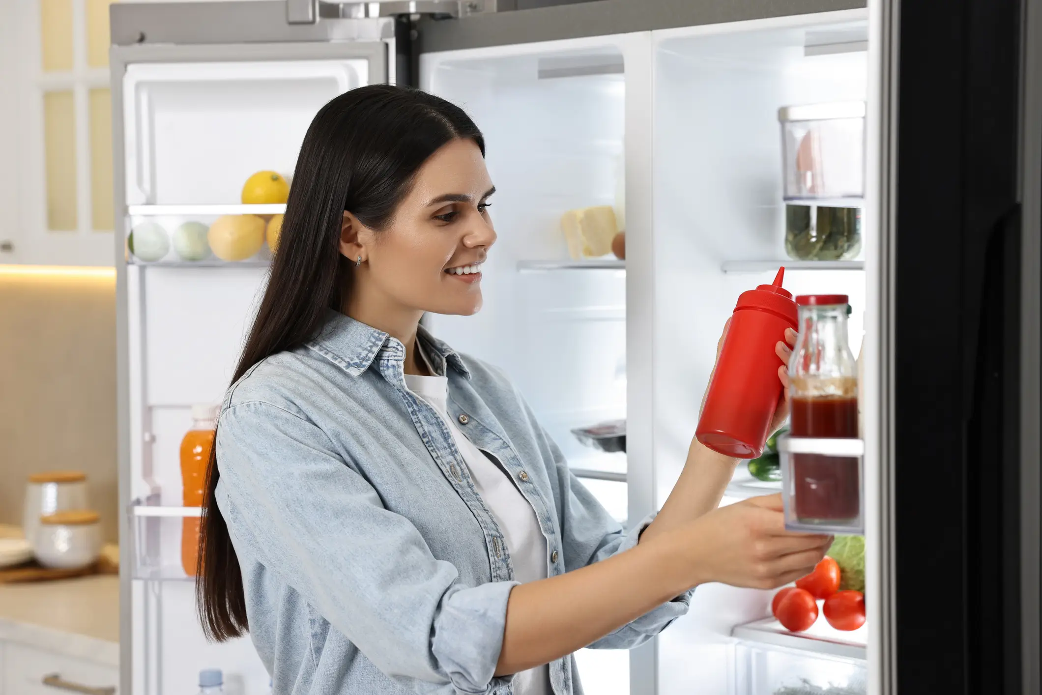 You too can be this happy if you keep your ketchup in the fridge (Liudmila Chernetska/Getty Images)