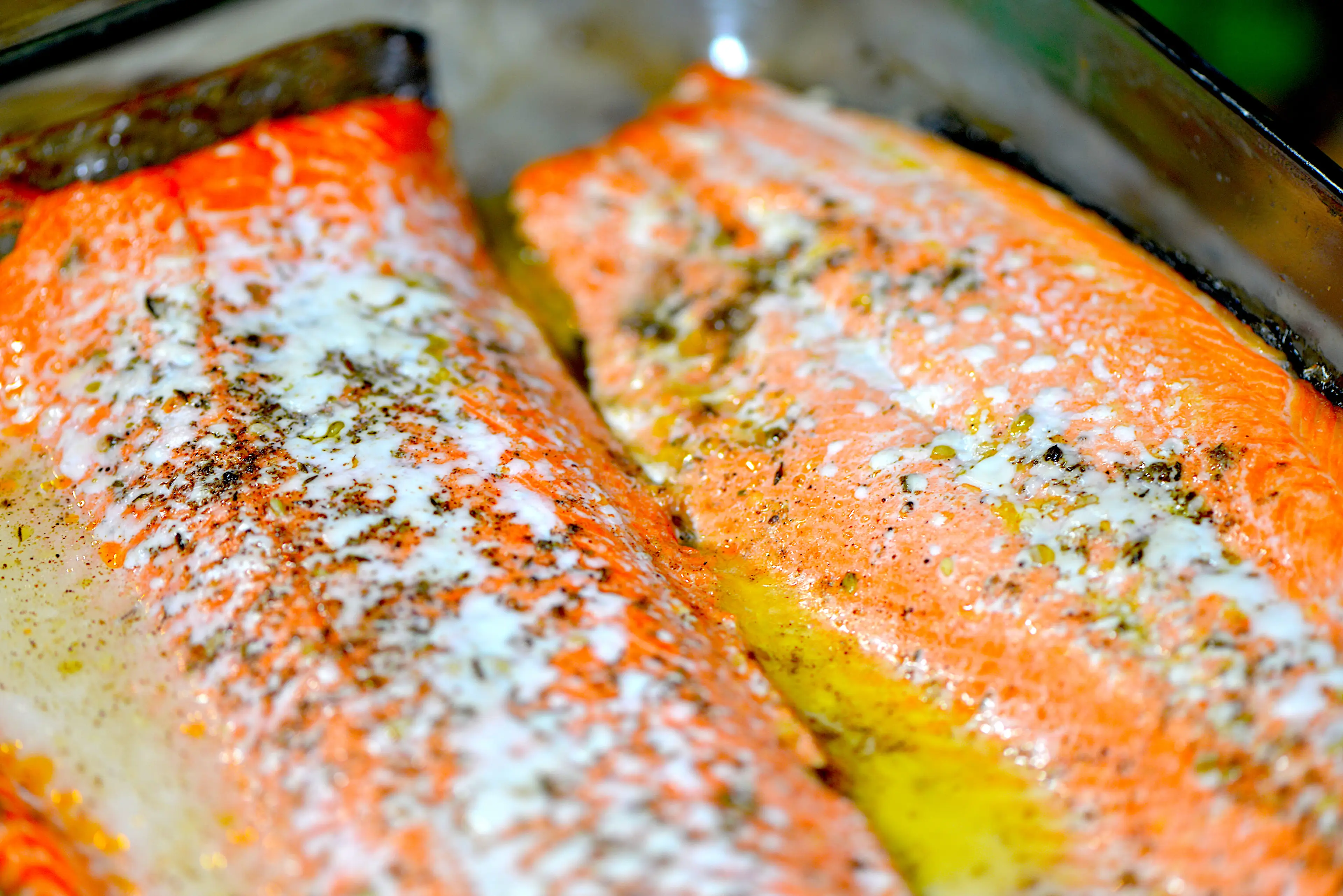 The 'white goo' you see on cooked salmon has been explained (Getty Stock Image)