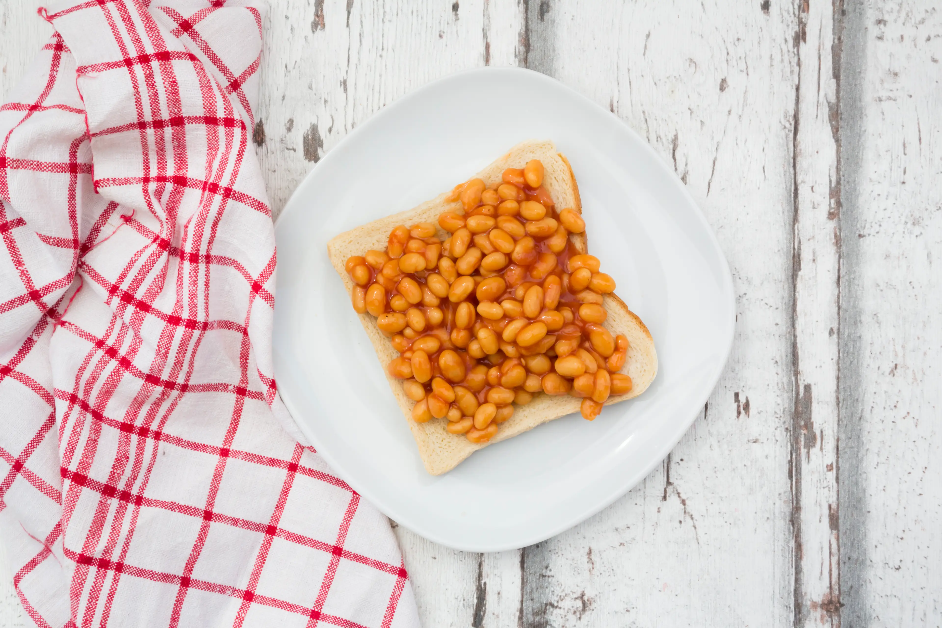 Some of the sportsmen enjoy eating beans on toast before getting on the pitch (Getty Stock Image)