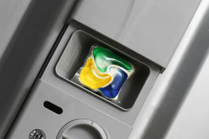 The jury is out on whether the plastics in dishwasher pods ever really dissolve. (Getty Images/ szakalikus)