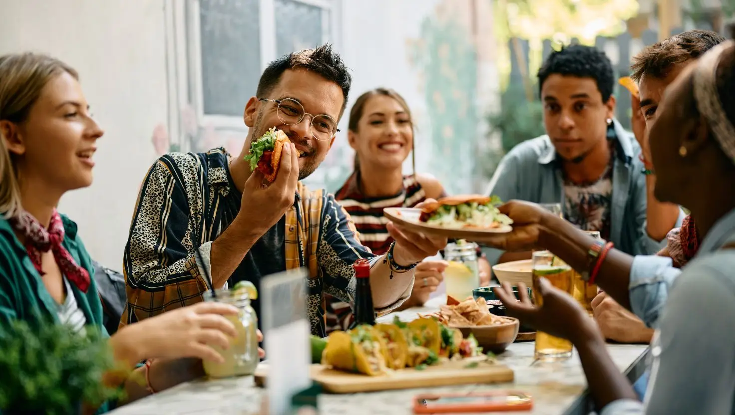 Some survey respondents admitted to making friends over food, while others claimed to have secured a date (Getty Stock Image)