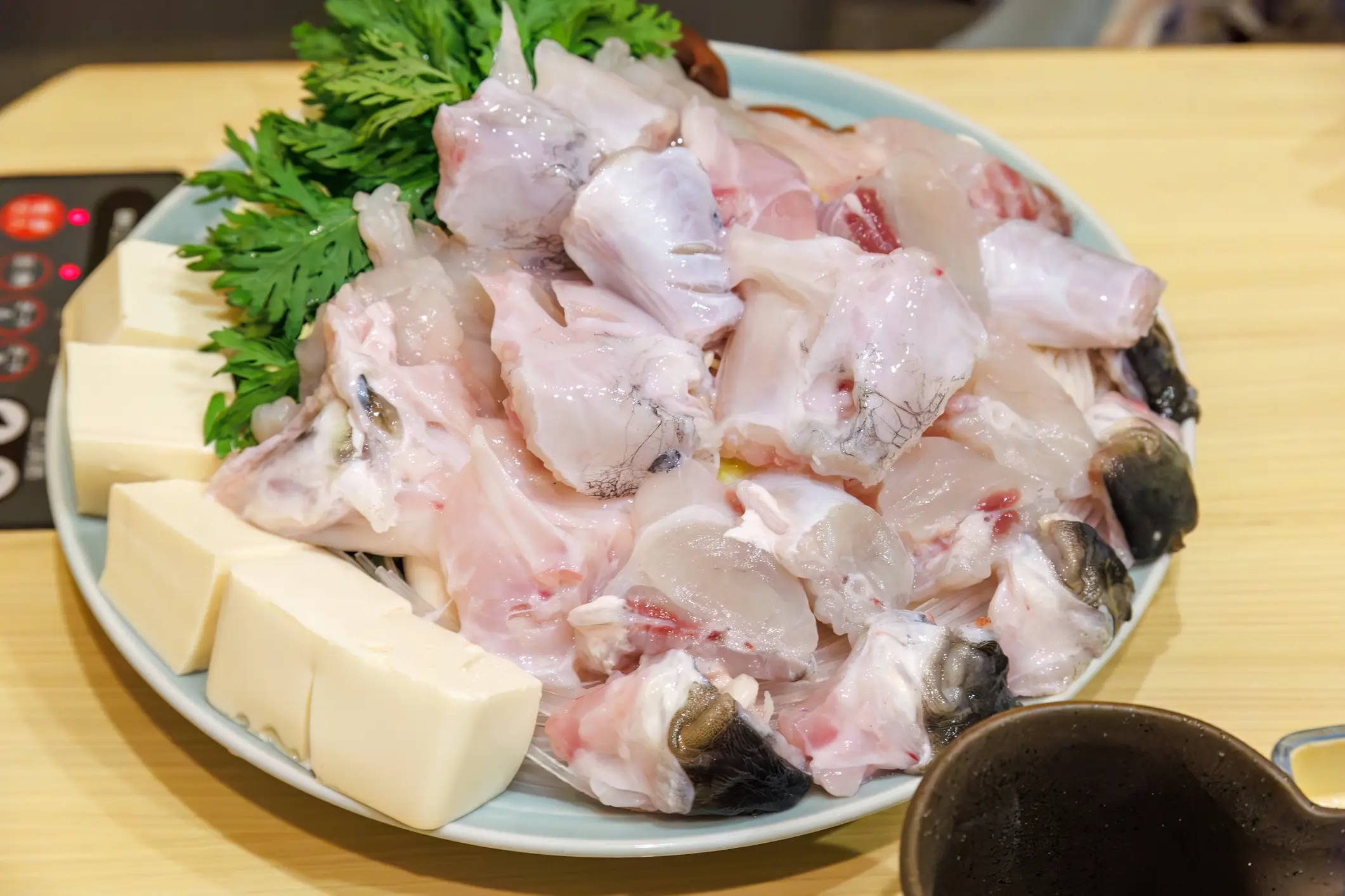 Fugurishi, a fugu hot pot dish - (d3_plus D.Naruse @ Japan/Getty Images)