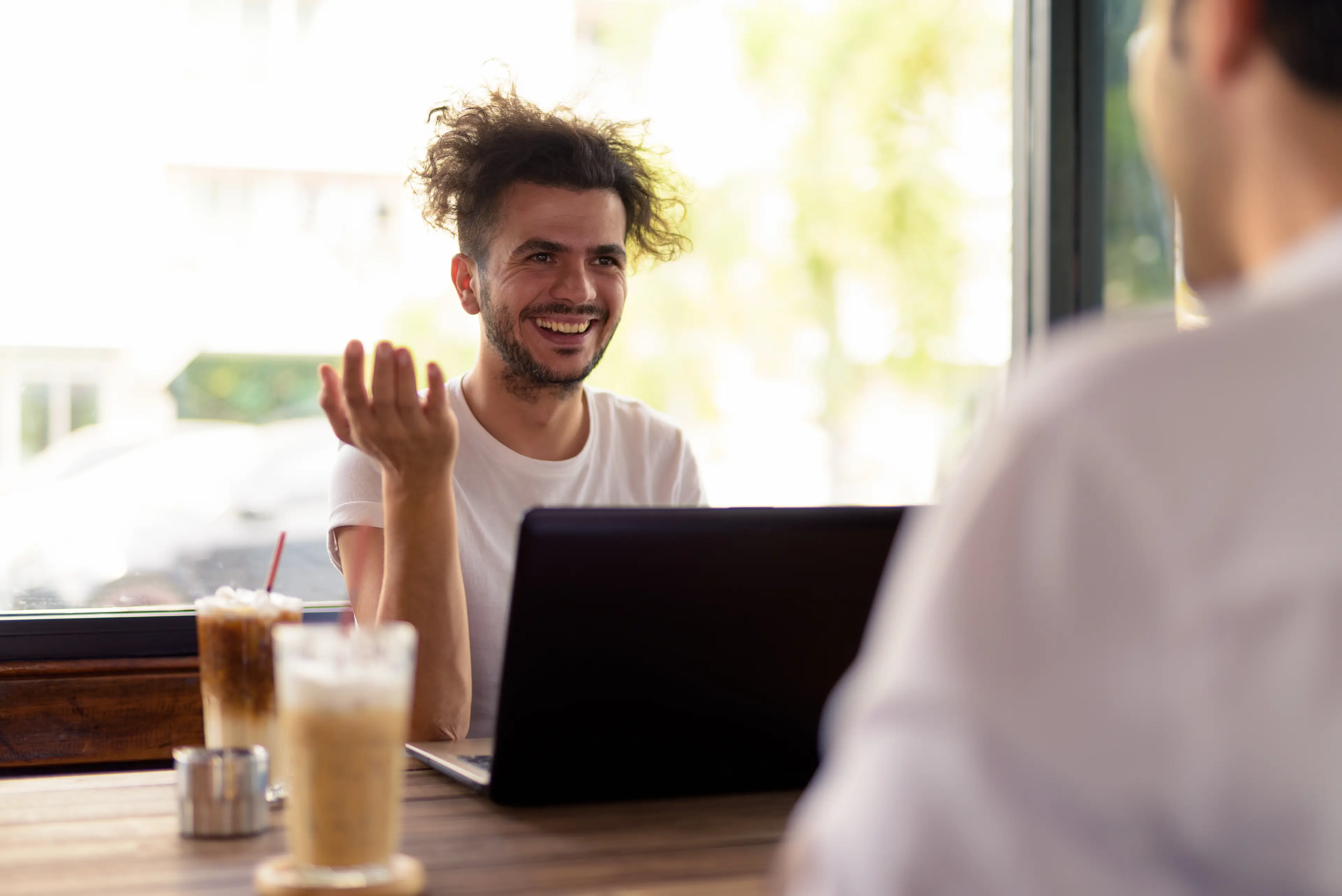 Social media users are divided on bringing iced drinks to interviews to impress hiring managers (Getty Stock Image)