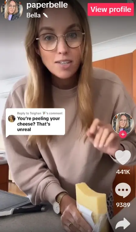 Bella sharing her cheese slicing technique - @paperbelle via TikTok