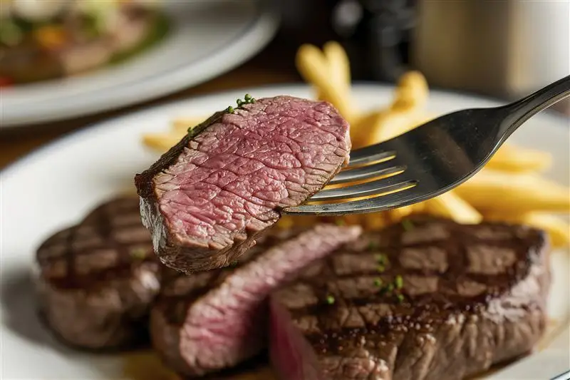 Rare and medium-rare steak are, by and large, safe to eat (Alberto Dima/500px/Getty Images)