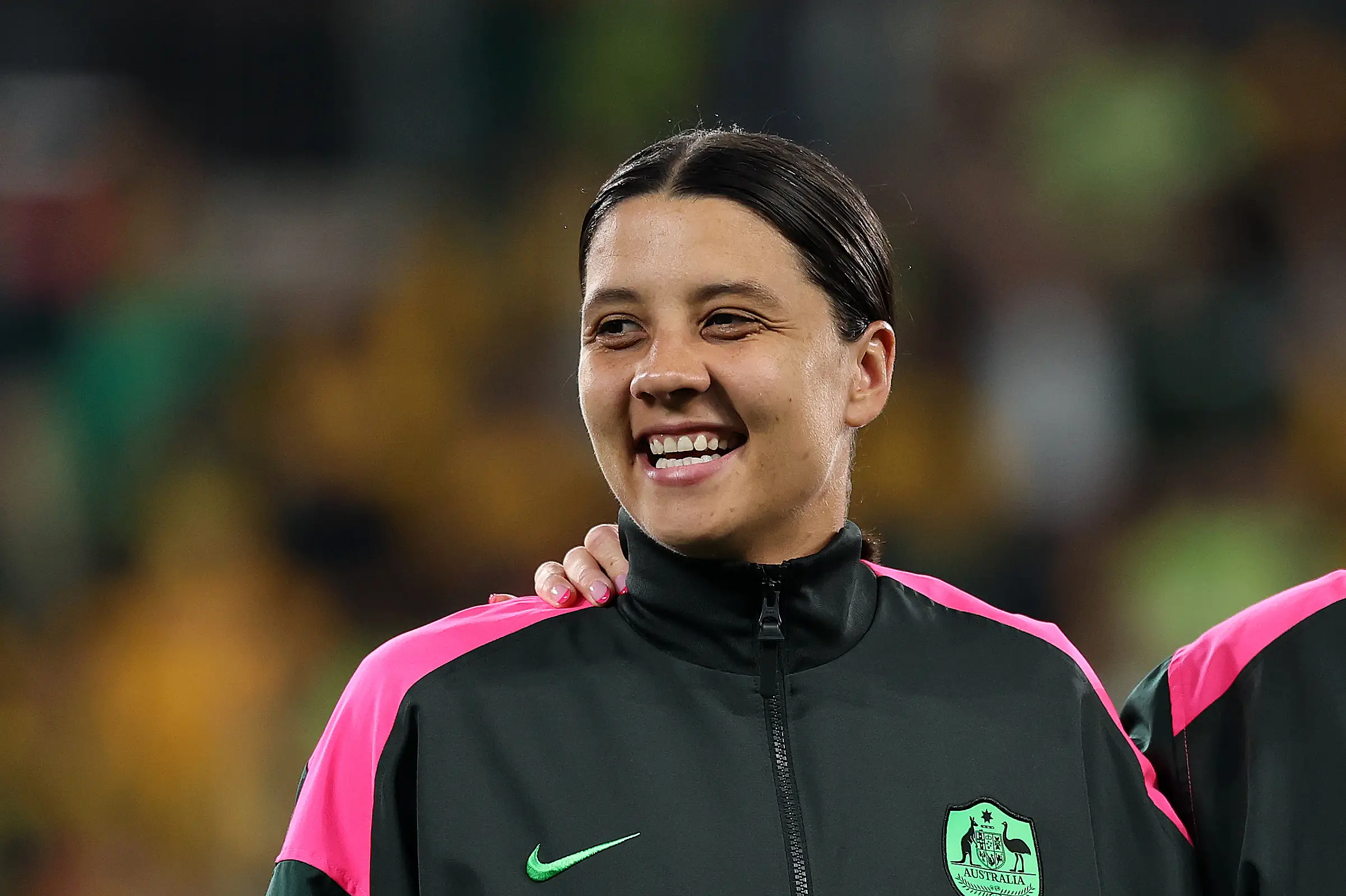 Australia's Sam Kerr enjoys a spaghetti sandwich (Cameron Spencer/Getty Images)