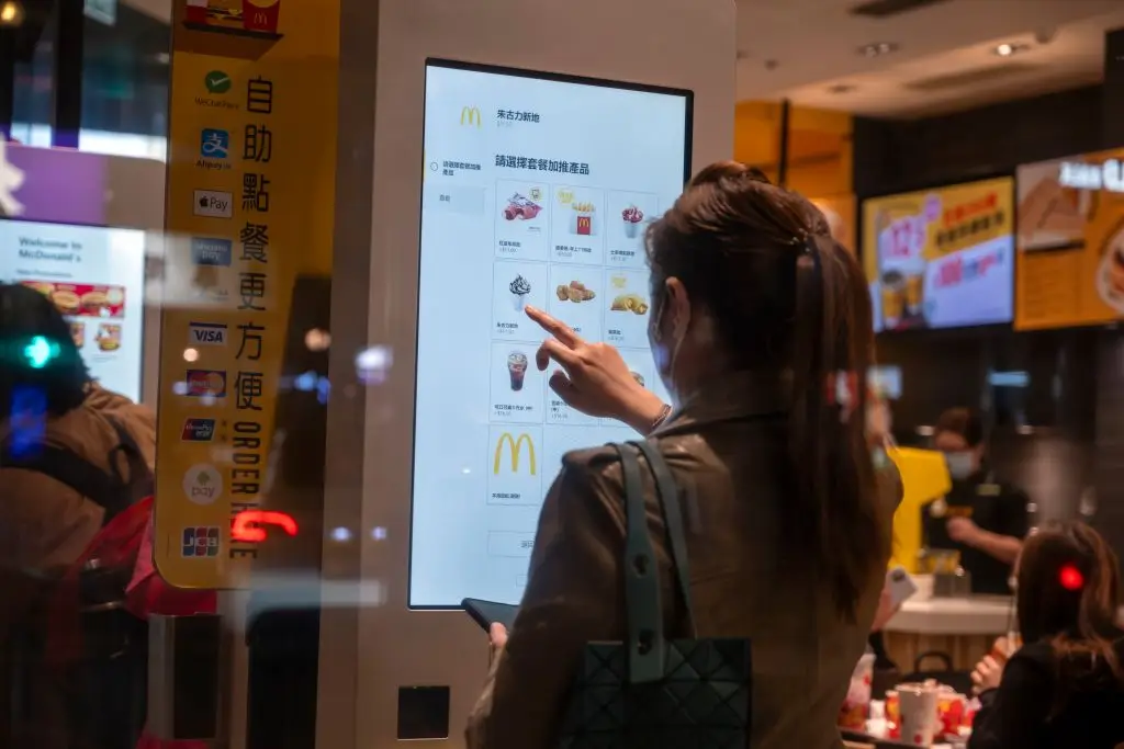 Self-service kiosks are available at McDonald's outlets around the world (UCG/Getty Images)