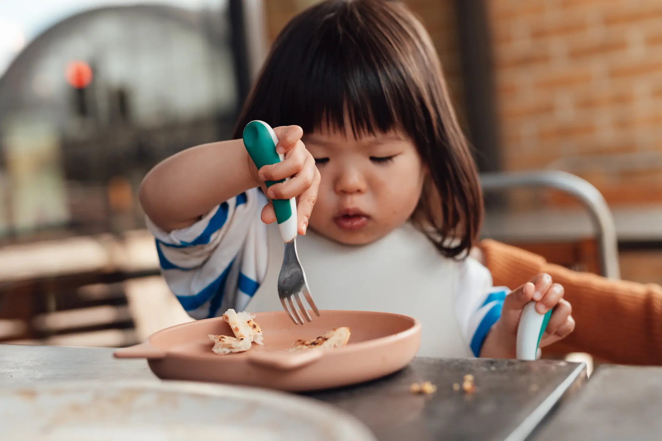 A cutlery user in training (Oscar Wong/Getty Images)