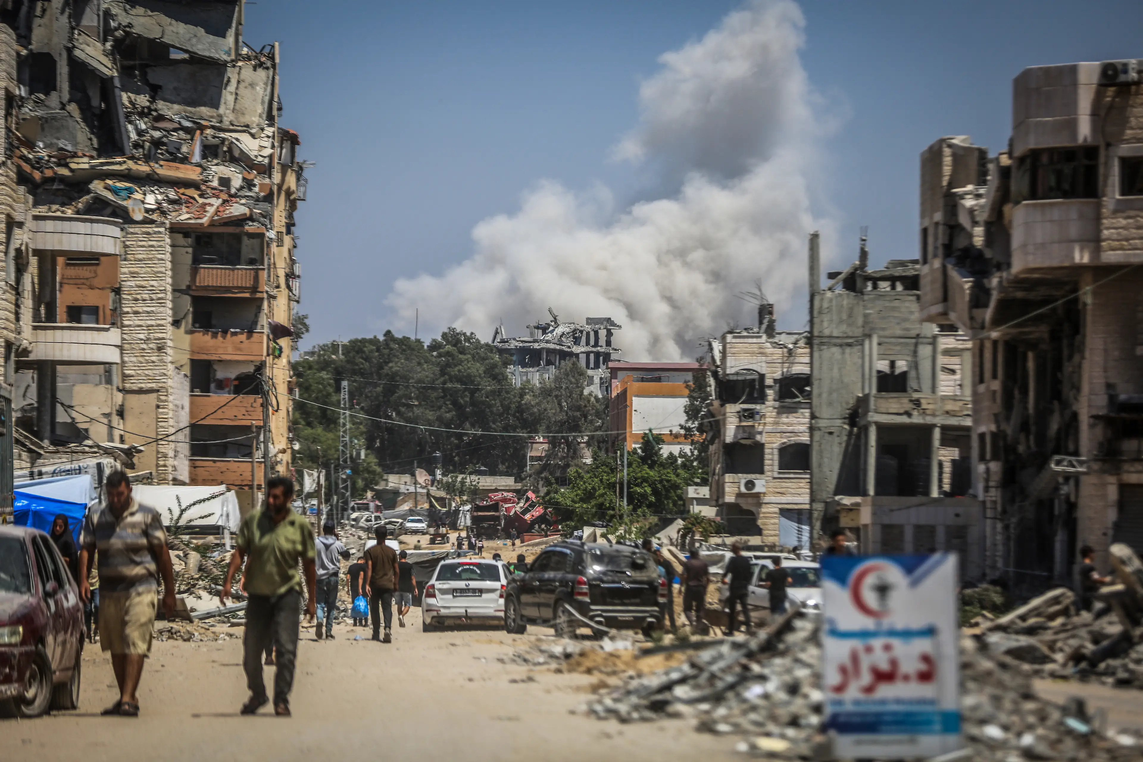 Smoke rises in Gaza following a 14 July airstrike by the Israeli military (Anadolu / Contributor/Getty Images)