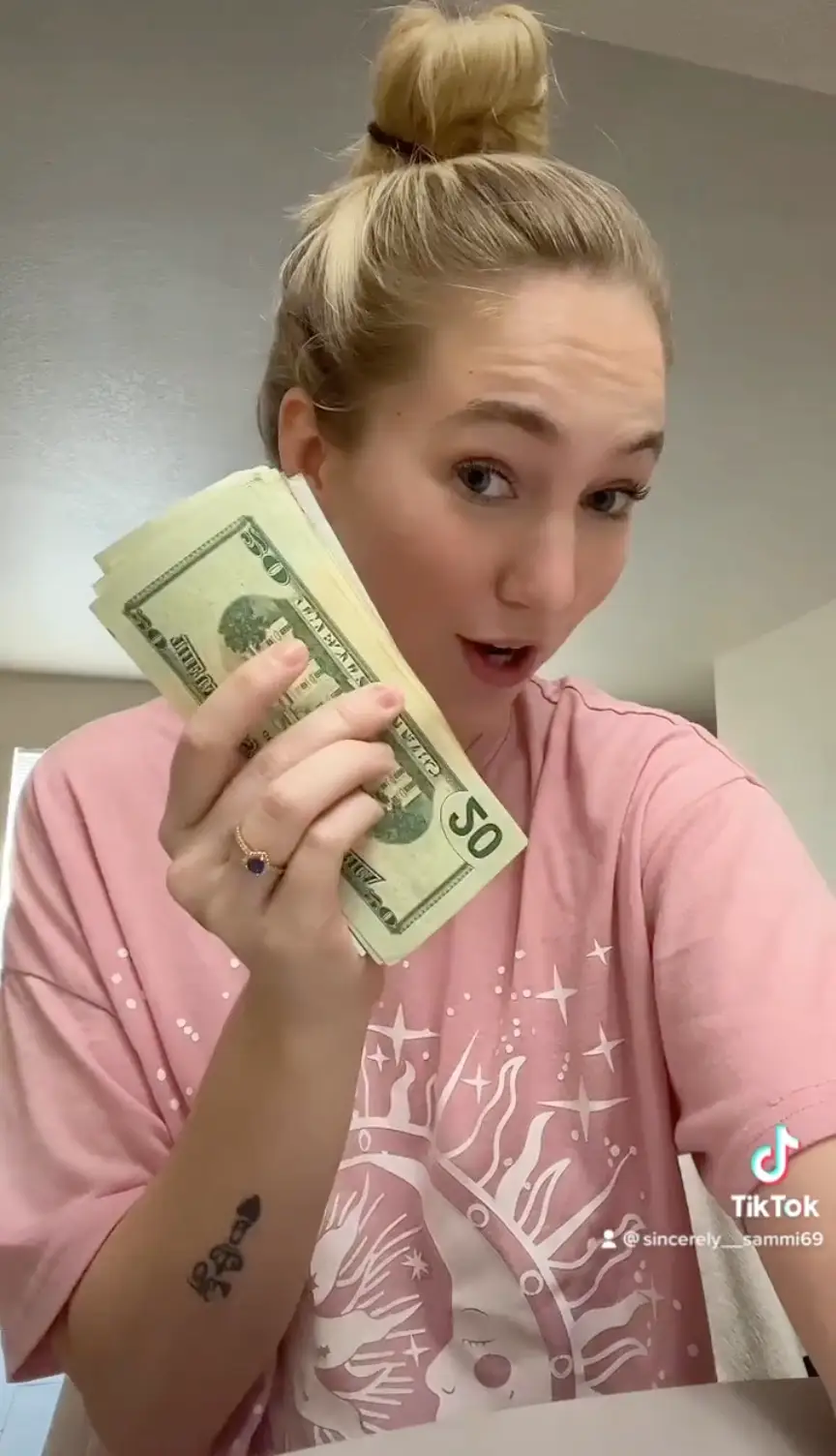 Sammi got $300 for cleaning the first out of five houses.
