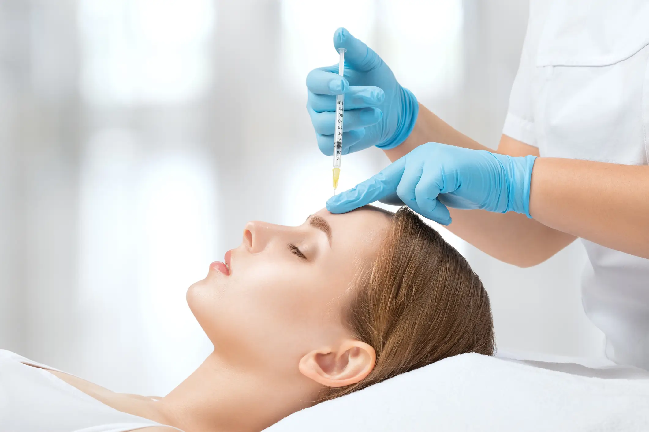 Botox between the eyebrows or on the forehead can cause eyelid droop (Getty Stock)