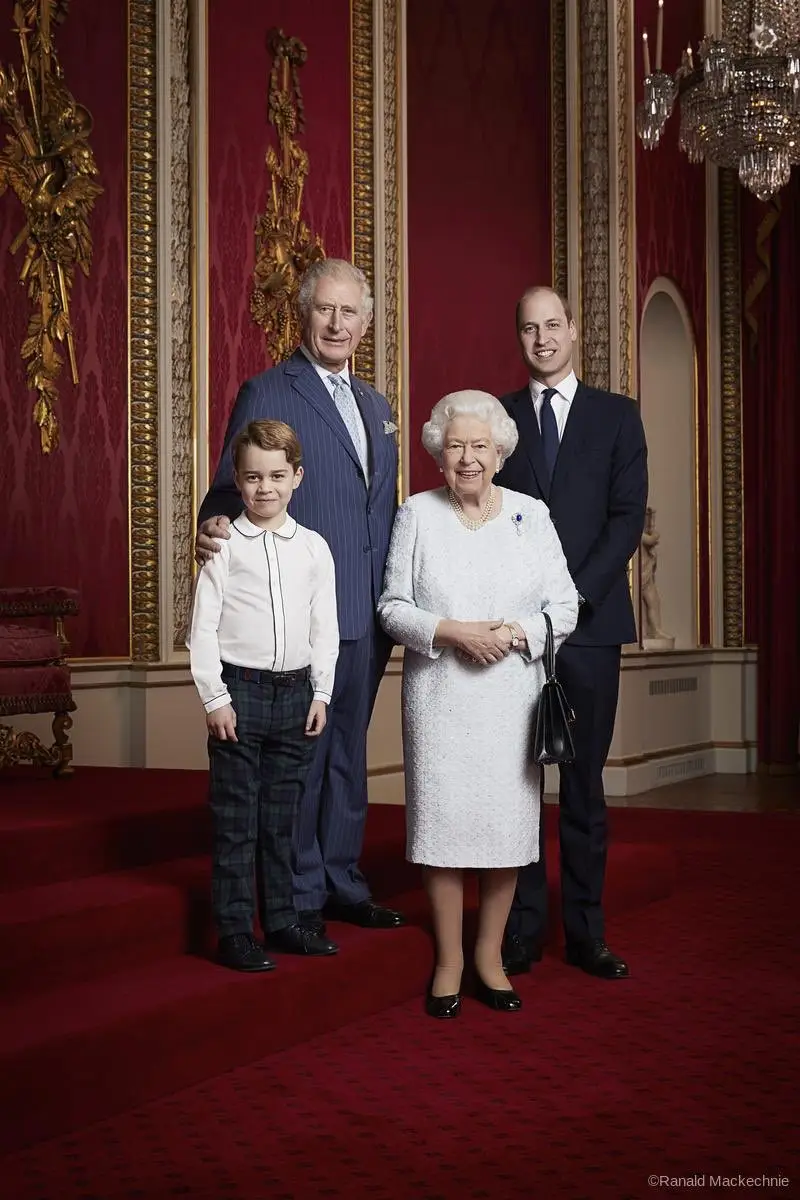 The 2022 portrait showed the Queen, who has since passed away, with the now King Charles, Prince William and Prince George. (X/RoyalFamily)