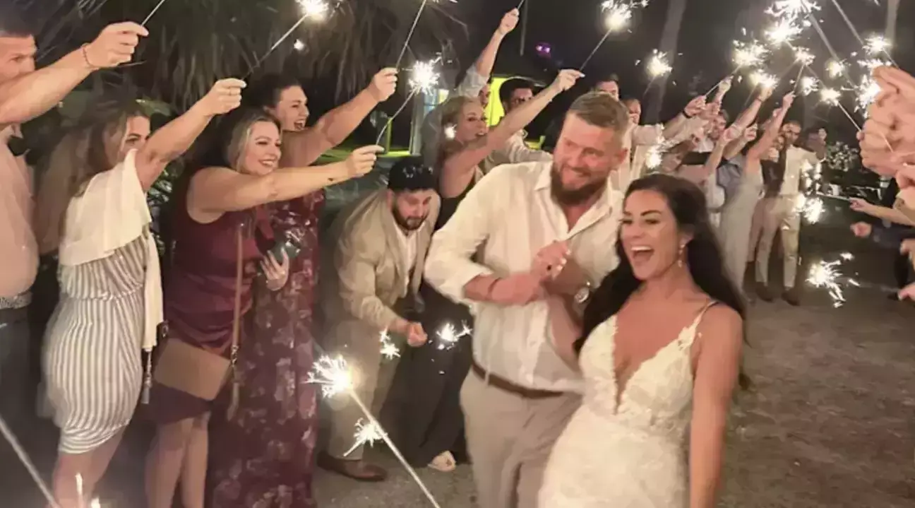 Aric Hutchison and Samantha Miller at their wedding reception (Annette Hutchinson/GoFundMe)