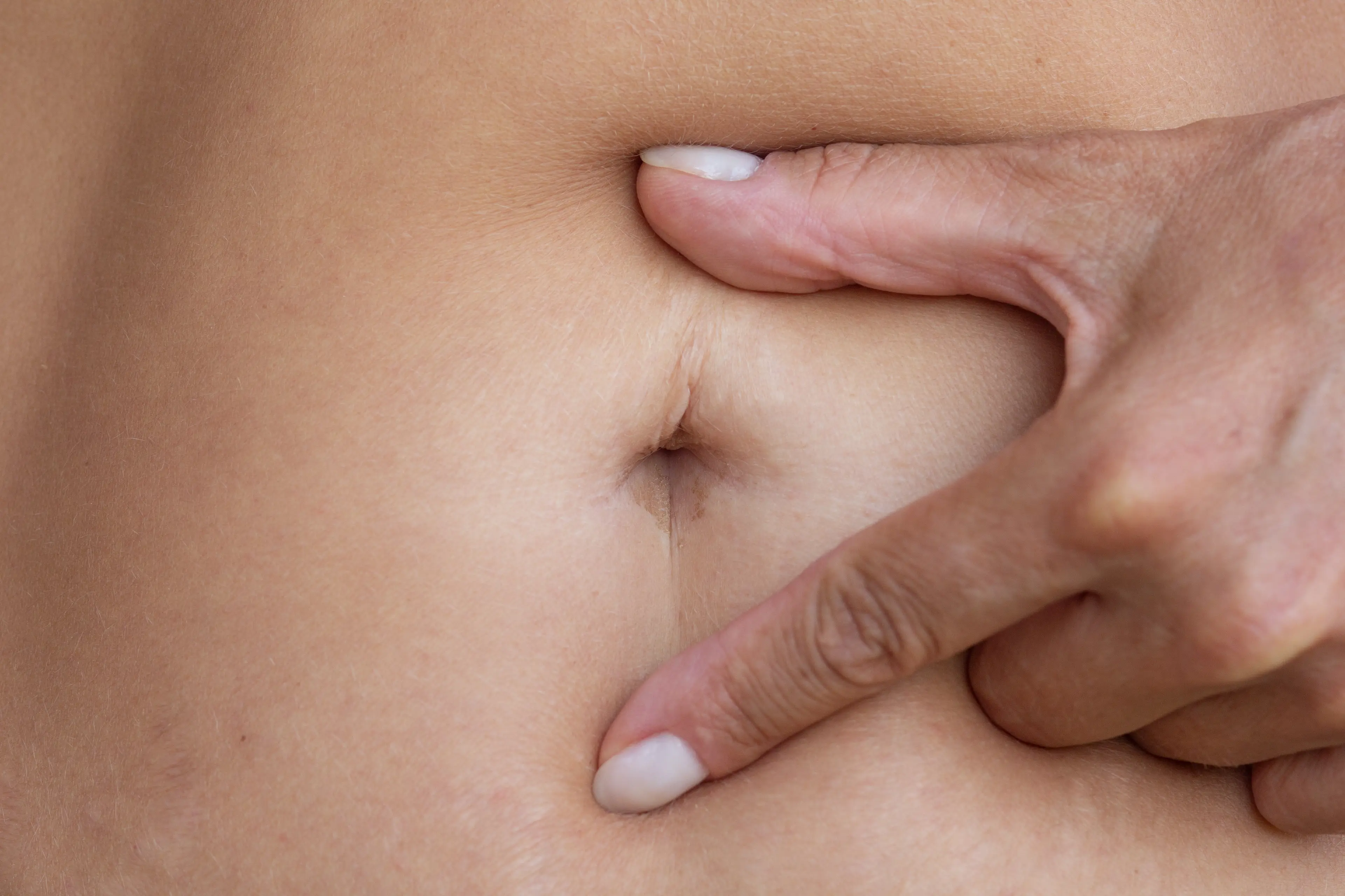 The experts explained how to properly care for an innie (Getty Stock Image)