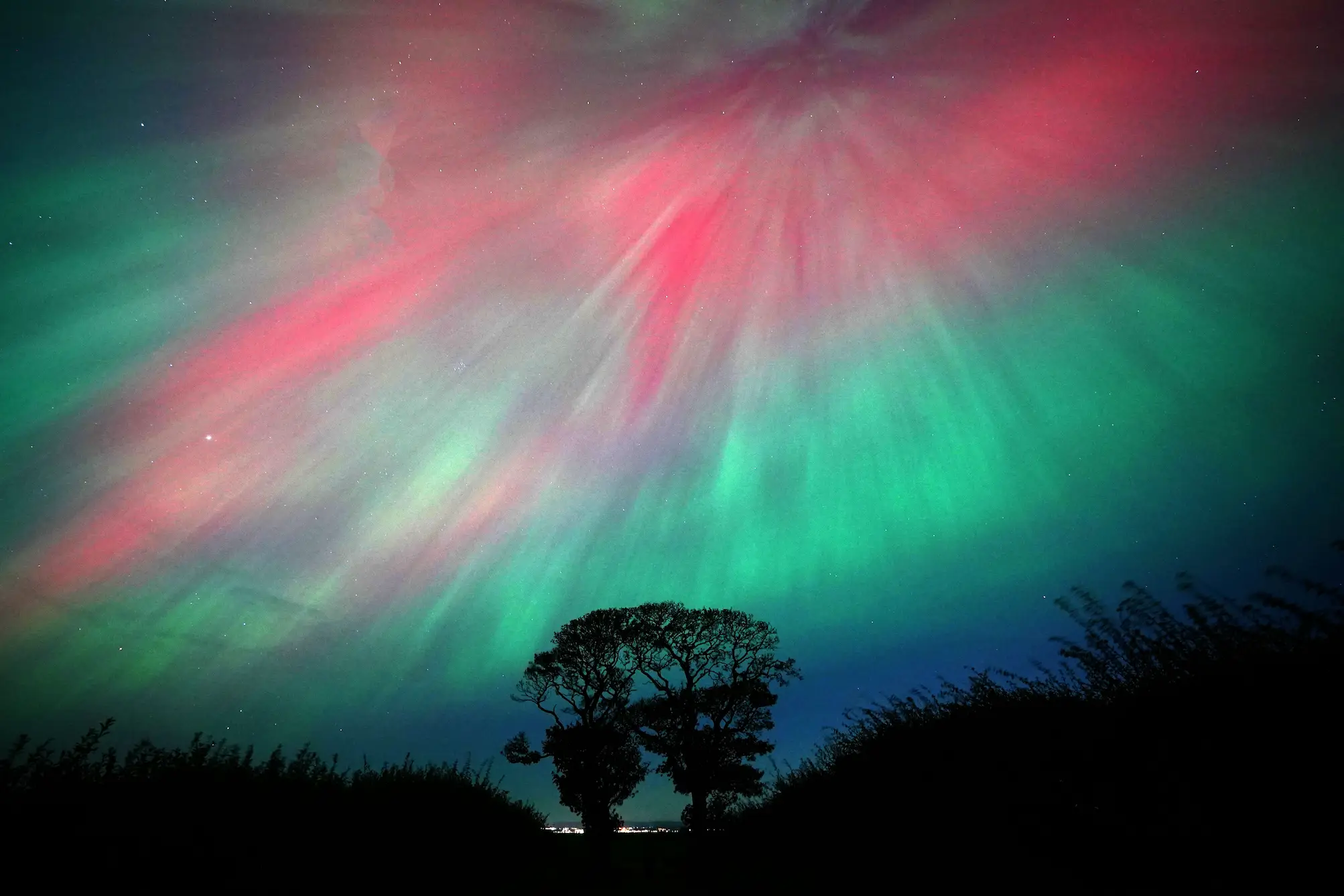 The Northern Lights will be visible in parts of the UK again later on this evening (11 October) (PA)