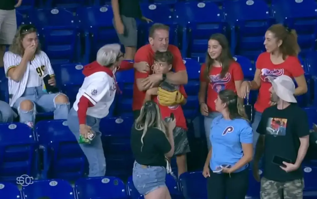 The now-viral moment saw the woman 'steal' the child's ball (ESPN)