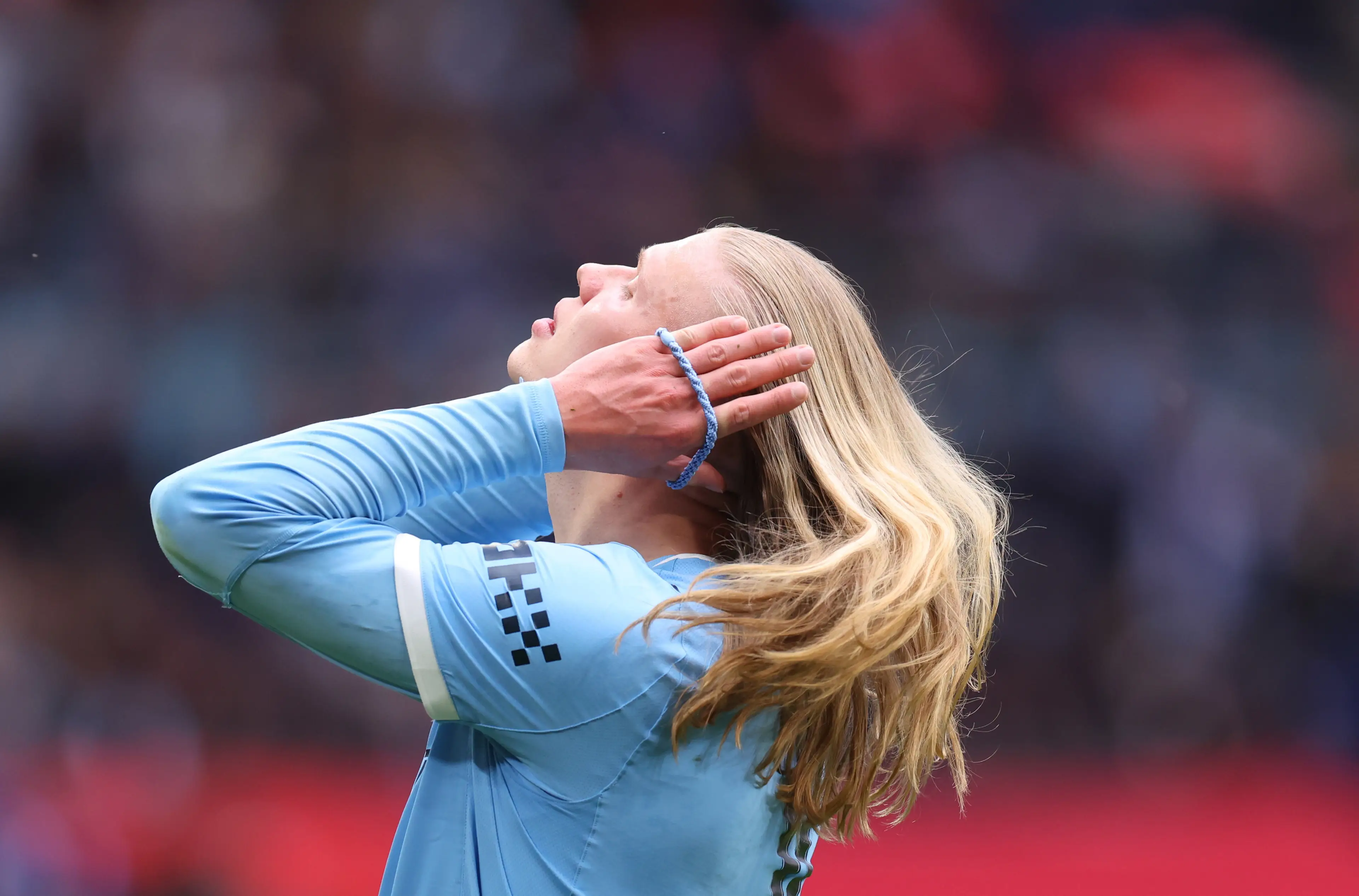 The striker is famed for his perfectly slicked-back bun (Catherine Ivill - AMA/Getty Images)