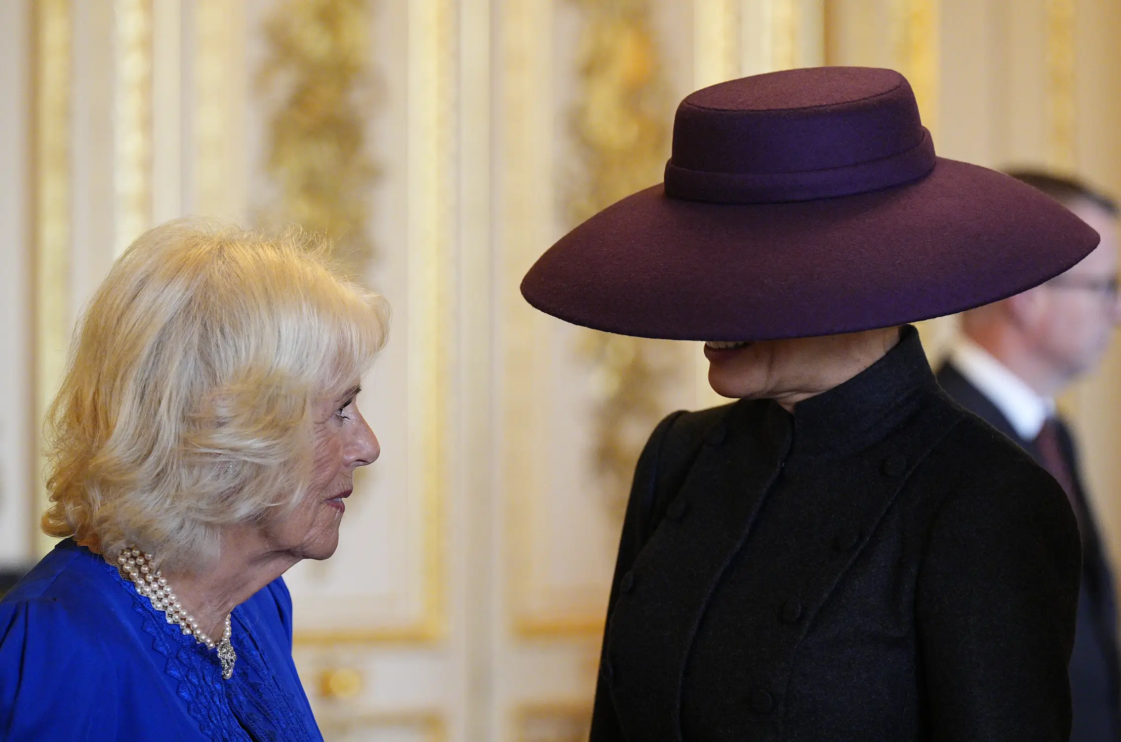 Melania opted for another wide-brimmed hat (Aaron Chown - WPA Pool/Getty Images)