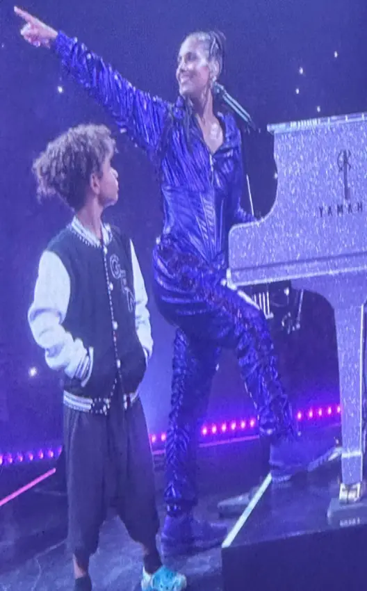 The eight-year-old appears to be taking his job very seriously.