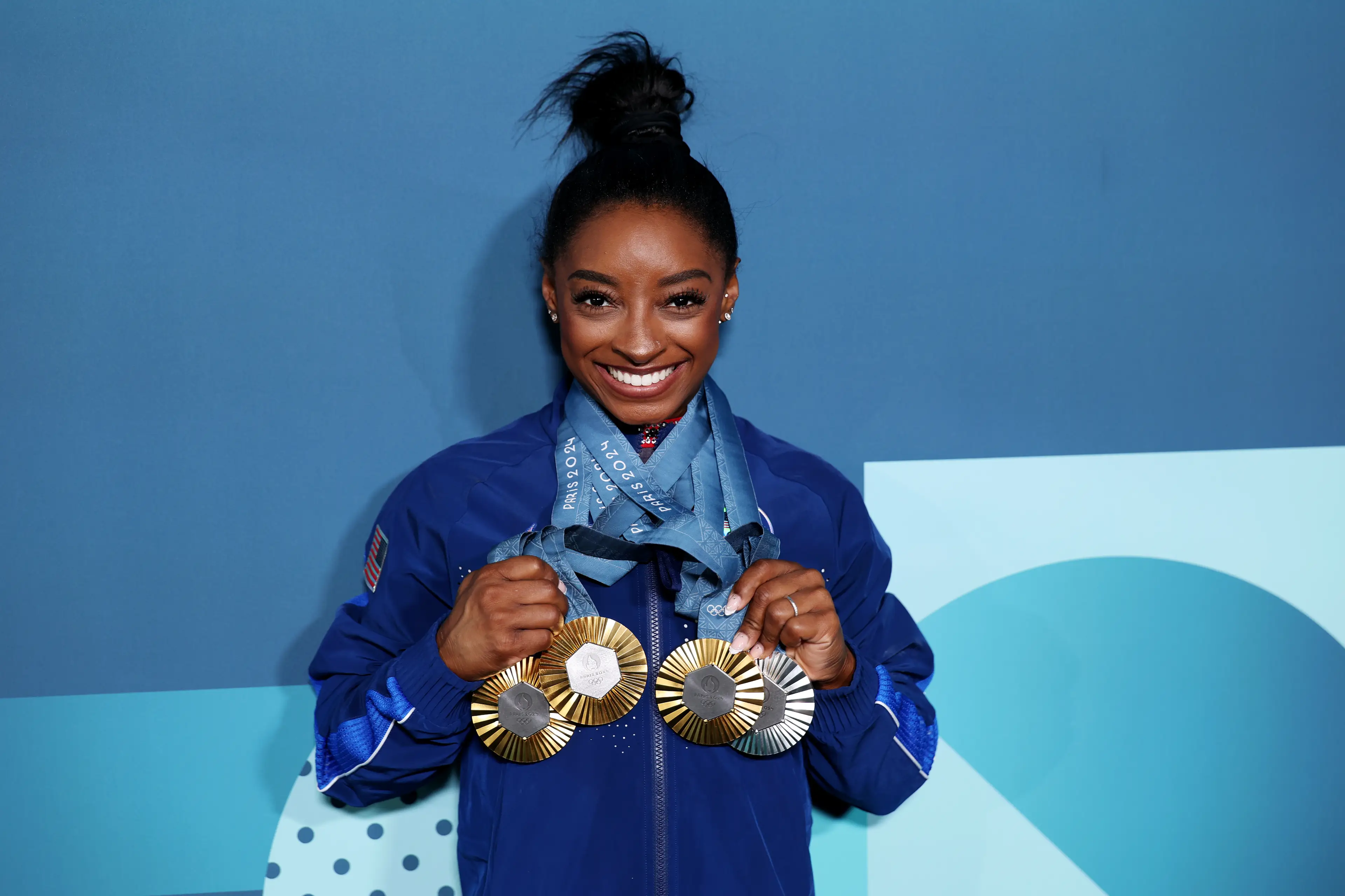Simone Biles is the most decorated gymnast in history. (Naomi Baker/Getty Images)