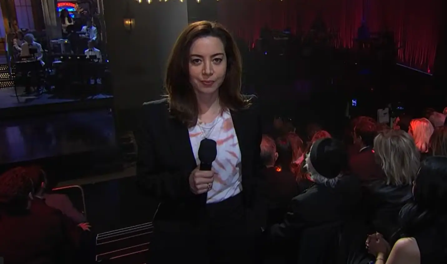 SNL viewers were quick to notice Plaza's tie-dye shirt (NBC)