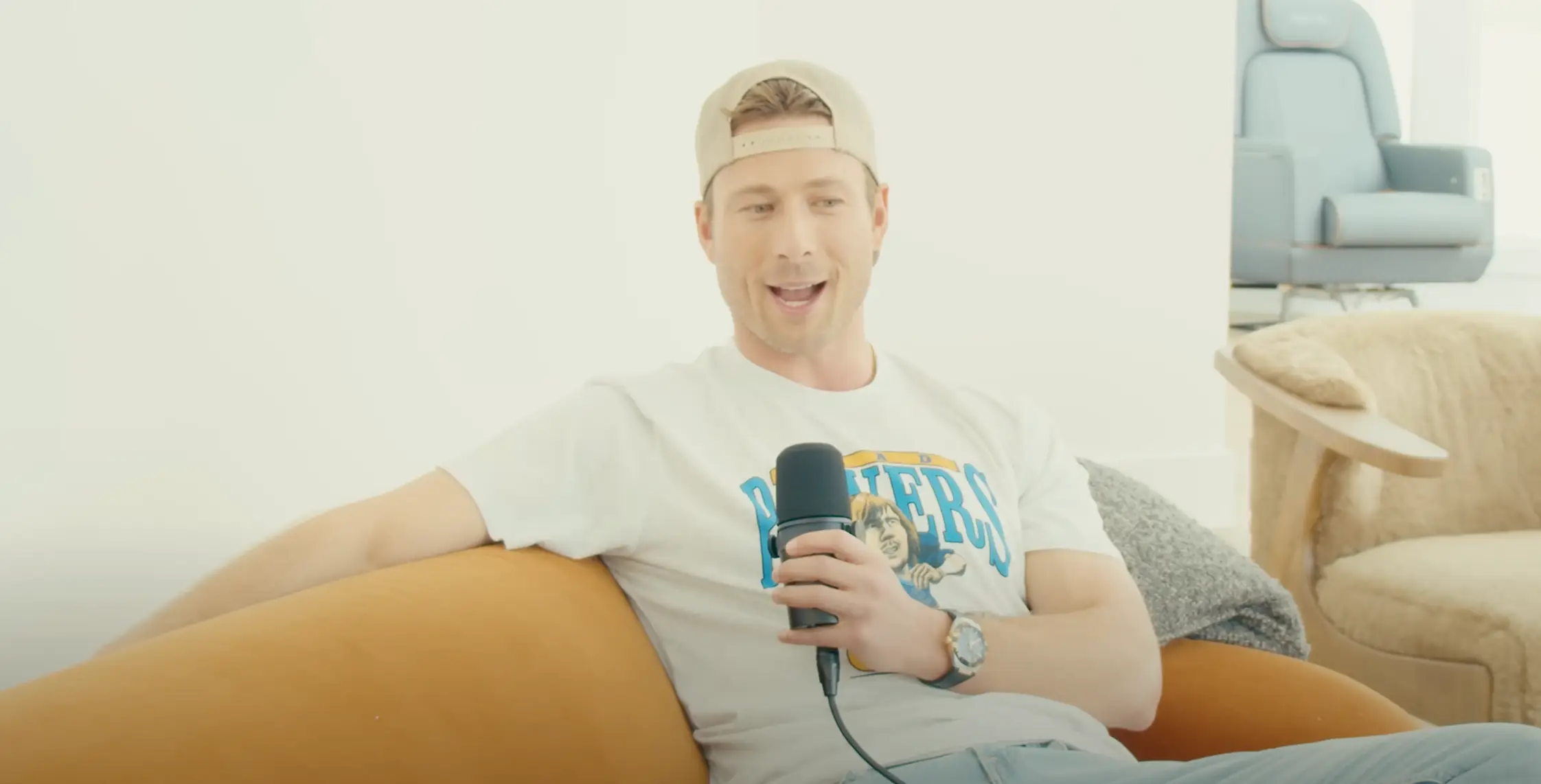 Glen Powell has been defended by fans following a 'poor choice of words' (Therapuss podcast/YouTube)
