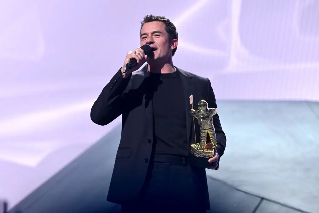 Orlando Bloom presented his partner Katy Perry with the Vanguard award at the VMAs last night (Noam Galai / Stringer / Getty Images)