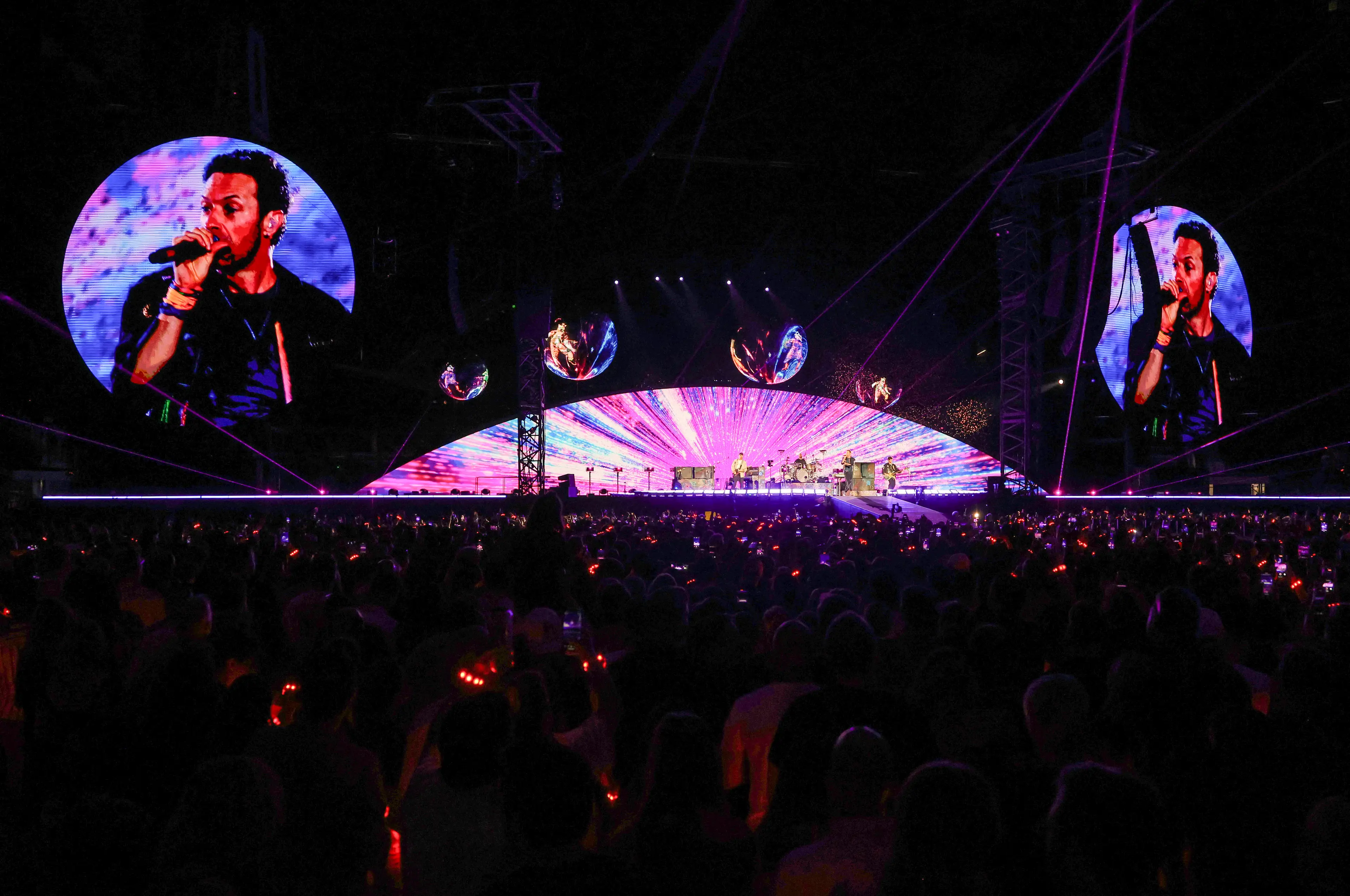 Chris Martin threw the couple up onto the big screen (Ethan Miller/Getty Images)