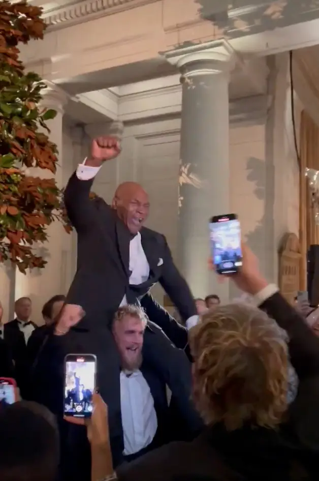 Mike Tyson was seen on Logan Paul's shoulders (X/@realDerekUtley)