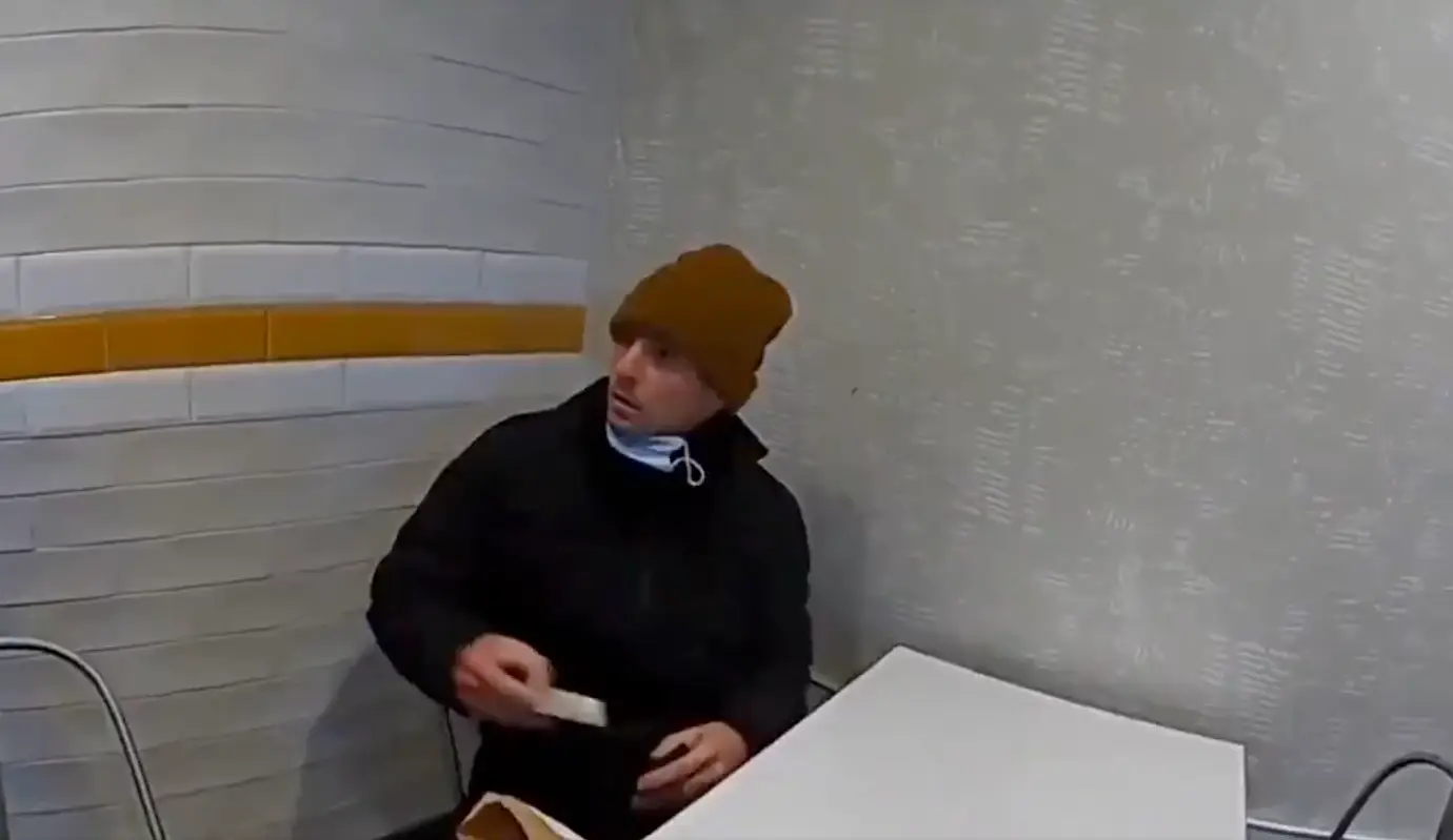 The moment police approached Mangione at the McDonald's has been released (Altoona Police Department)