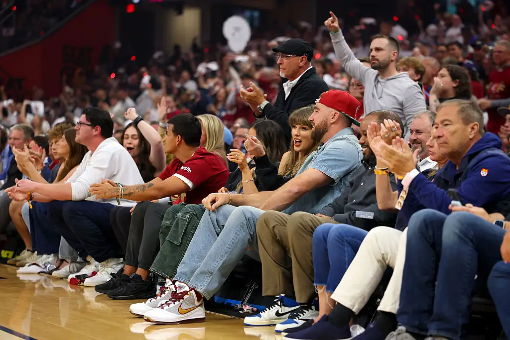 Fans couldn't help but notice that the tall couple didn't fit 'comfortable' in the courtside seats (Gregory Shamus / Staff / Getty Images)